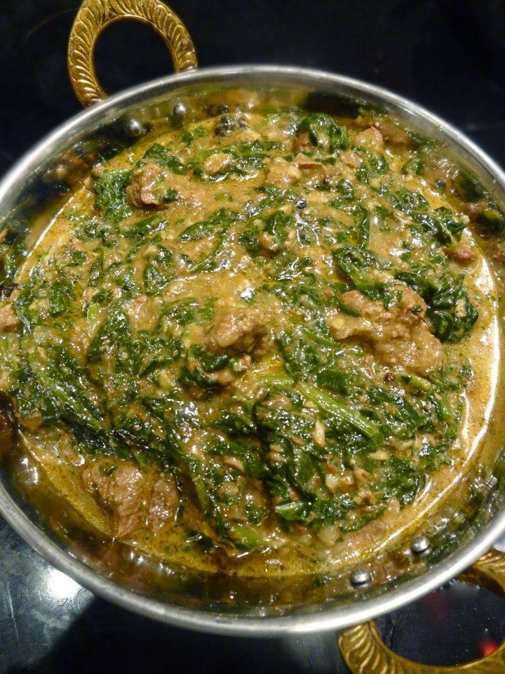 Order Palak Goat food online from Minerva Indian Cuisine store, Gaithersburg on bringmethat.com