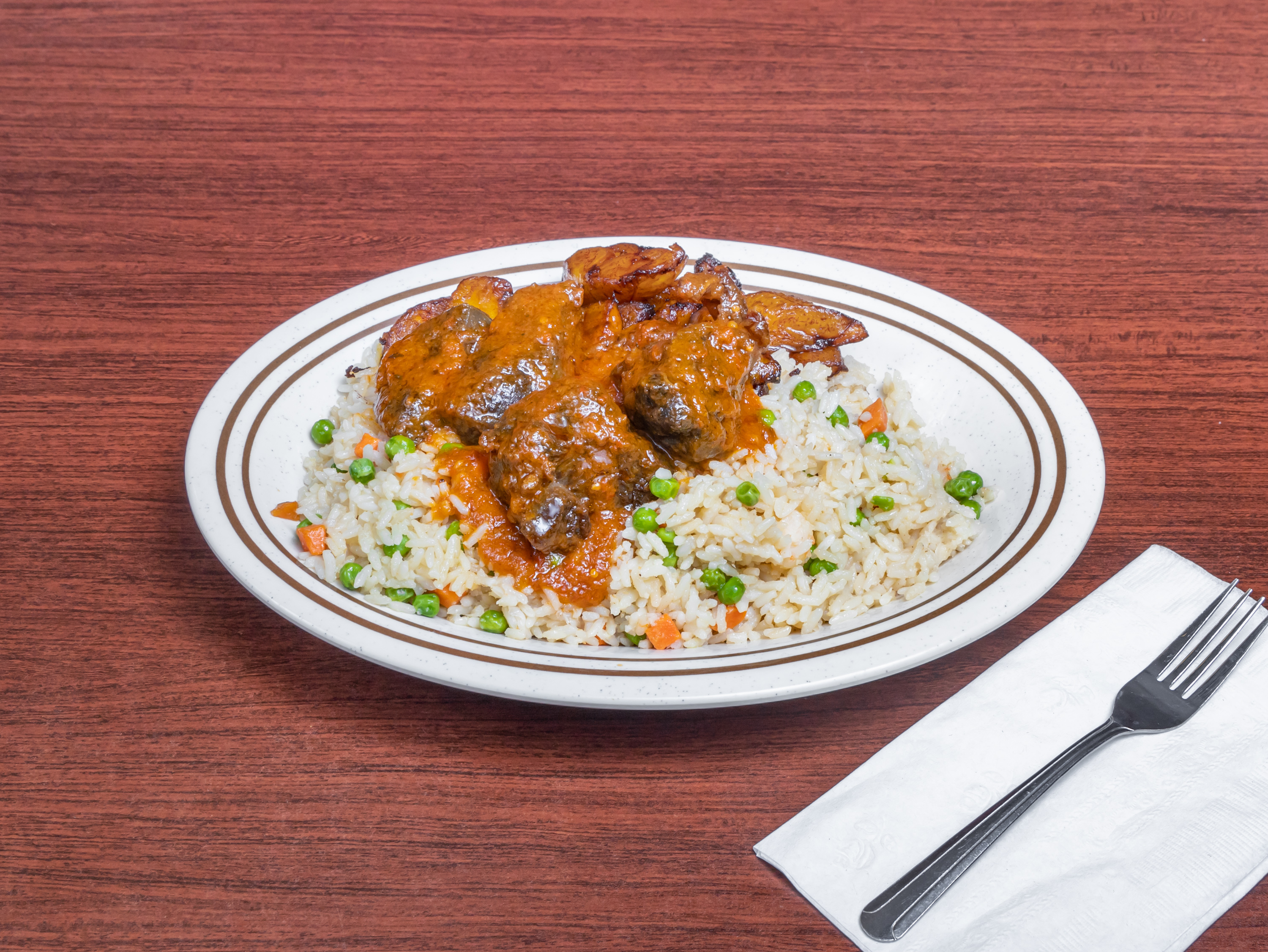 Order Coconut Rice food online from Marie African Restaurant store, Houston on bringmethat.com