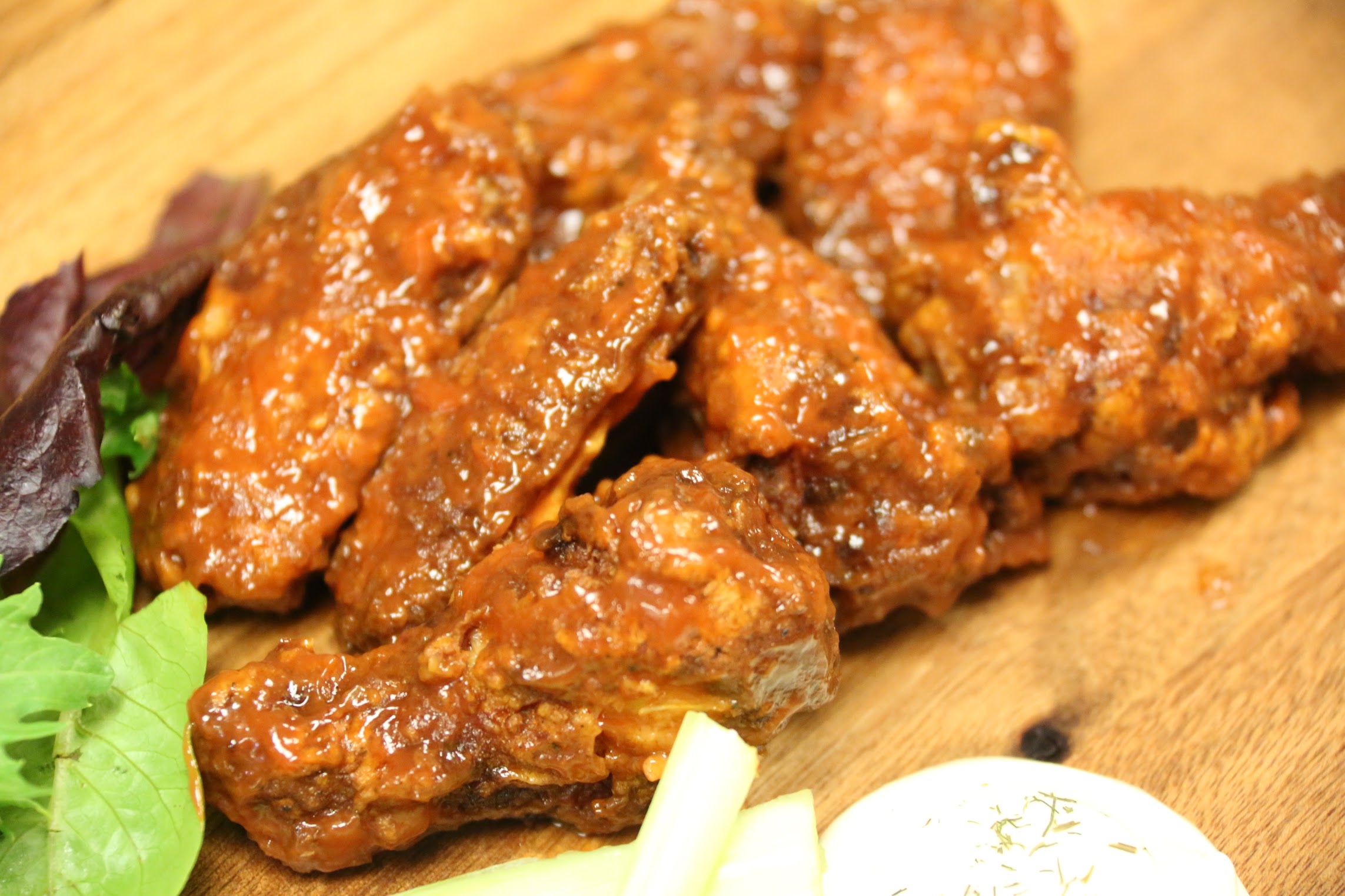Order Honey Smoked BBQ Wings food online from The Burger Joint store, New York on bringmethat.com