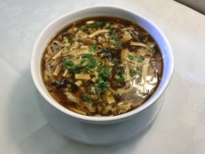 Order C2. Hot & Sour Soup 酸辣汤 food online from Garage Restaurant store, San Gabriel on bringmethat.com