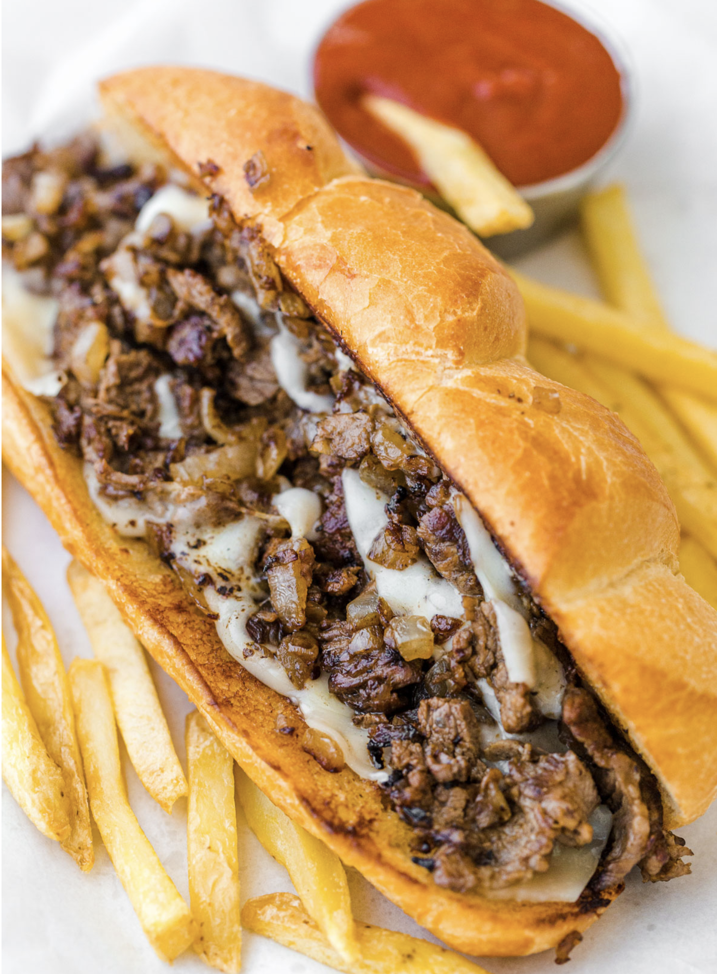 Order Philly Cheesesteak Sandwich food online from Dinozzo Pizza store, Royersford on bringmethat.com