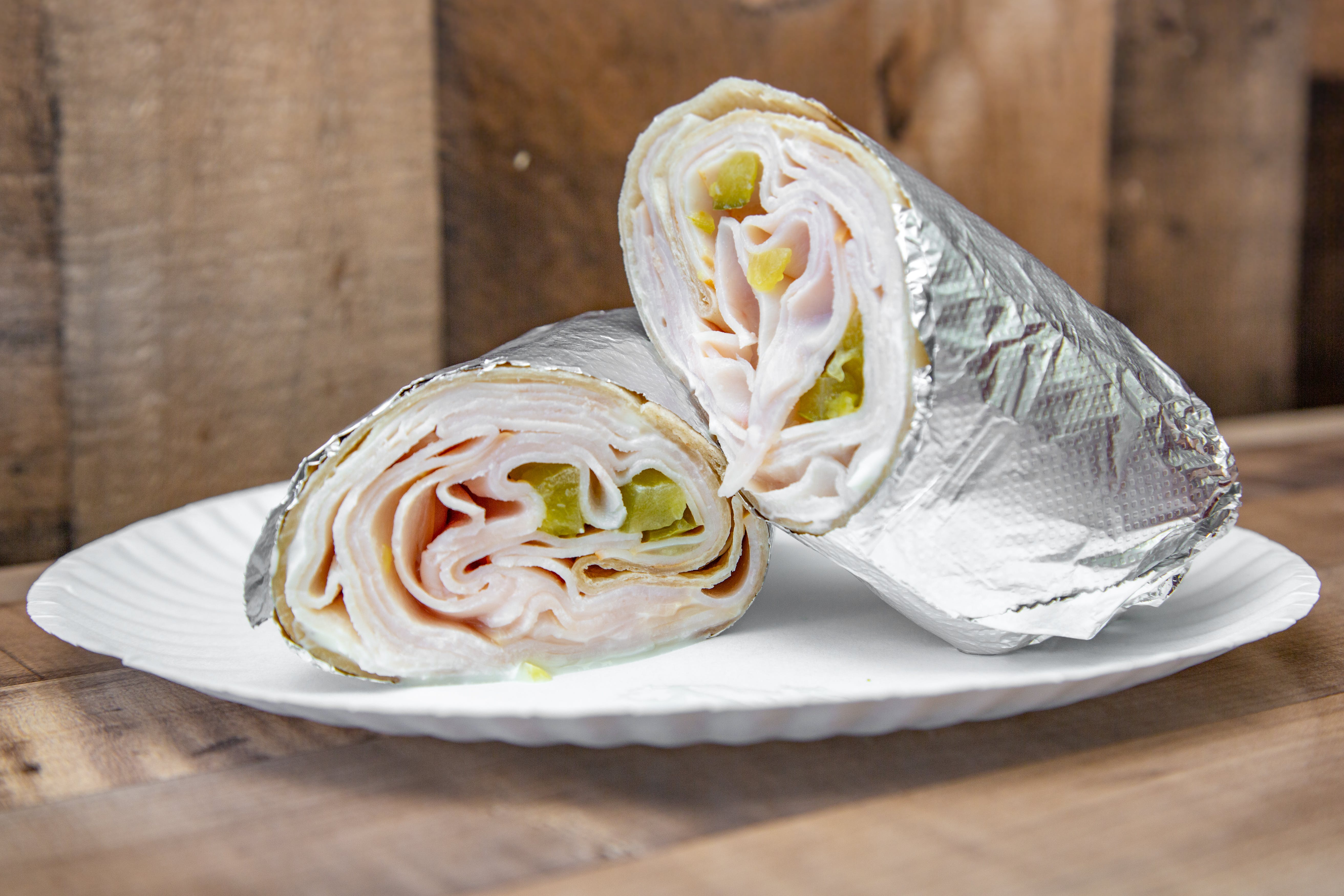 Order Turkey Club Wrap - Wrap food online from Mama Ginas store, Somerville on bringmethat.com