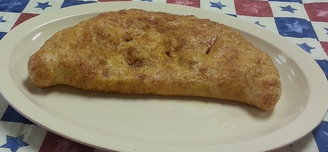 Order Calzone With One Topping food online from Que Pizza Ricco store, Laredo on bringmethat.com