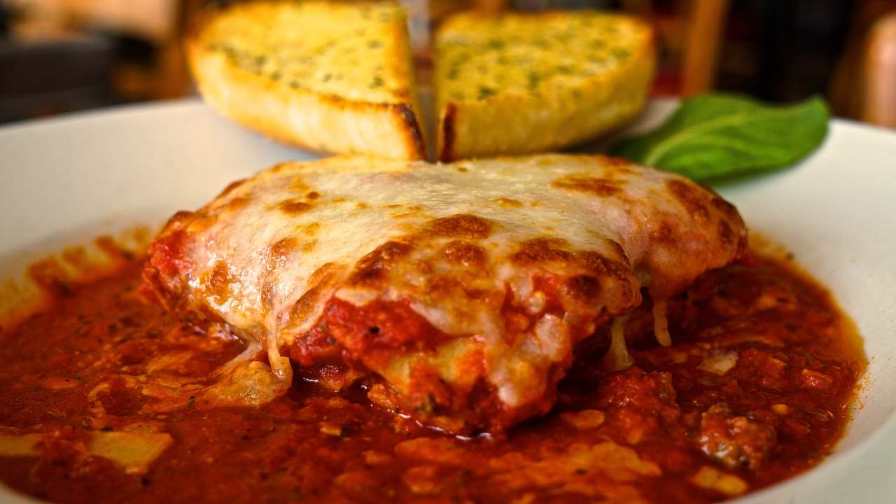 Order Homemade Beef Lasagna food online from Romes Pizza store, Helotes on bringmethat.com