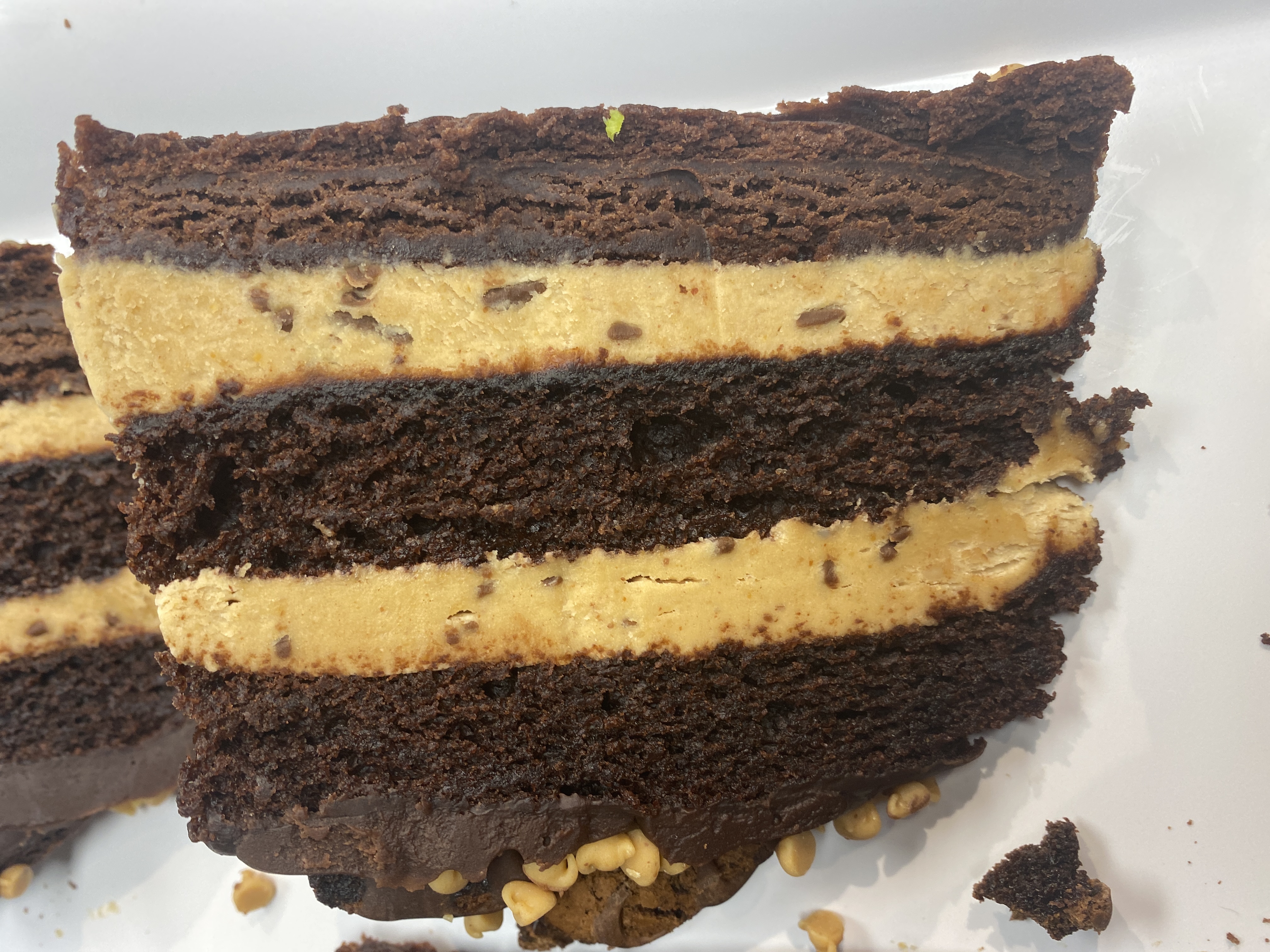Order Peanut Butter Explosion Cake food online from Cravings Dessert Lounge store, Ypsilanti on bringmethat.com