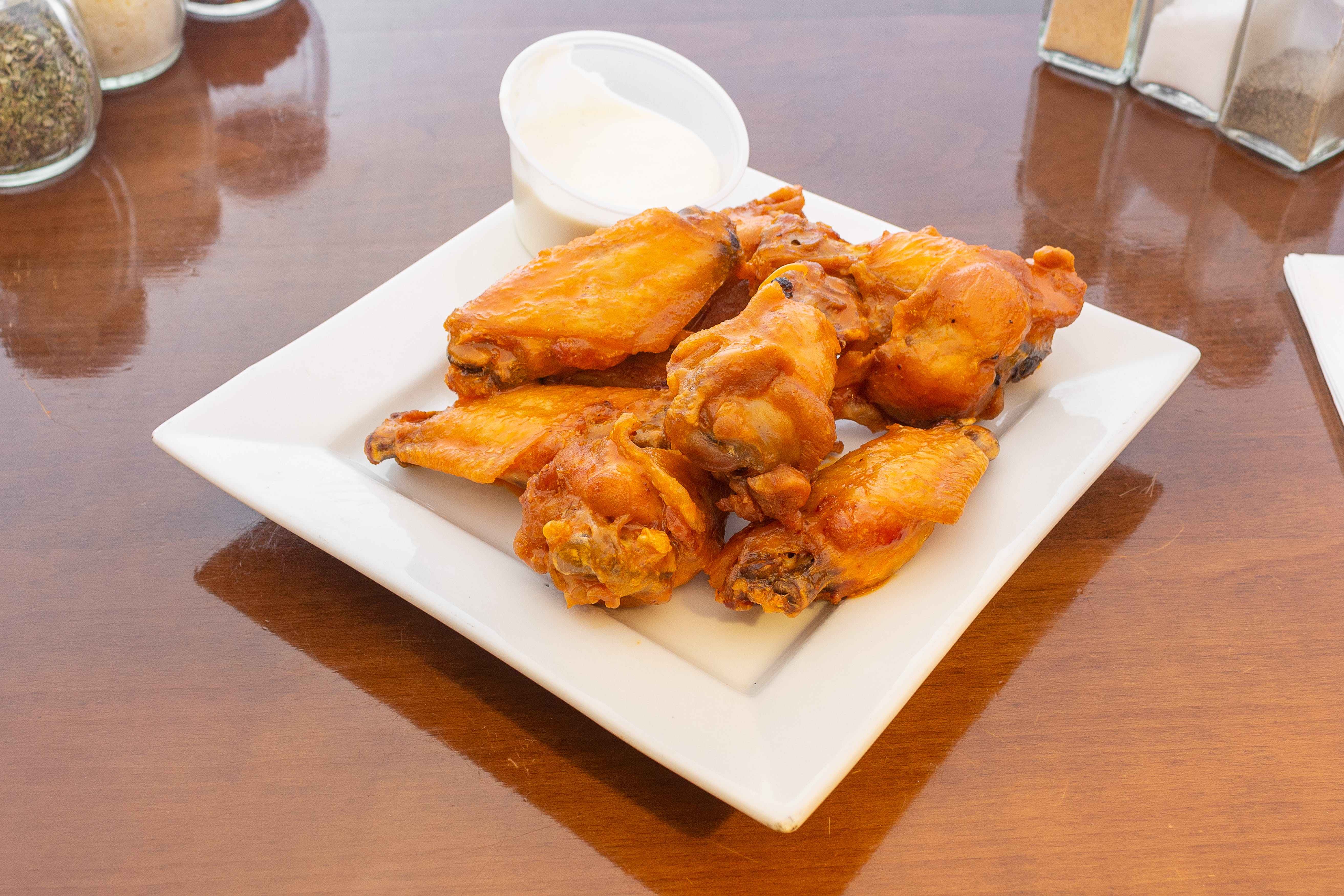 Order Buffalo Chicken Wings - Appetizer food online from Pompilio Pizzeria & Restaurant store, Westwood on bringmethat.com