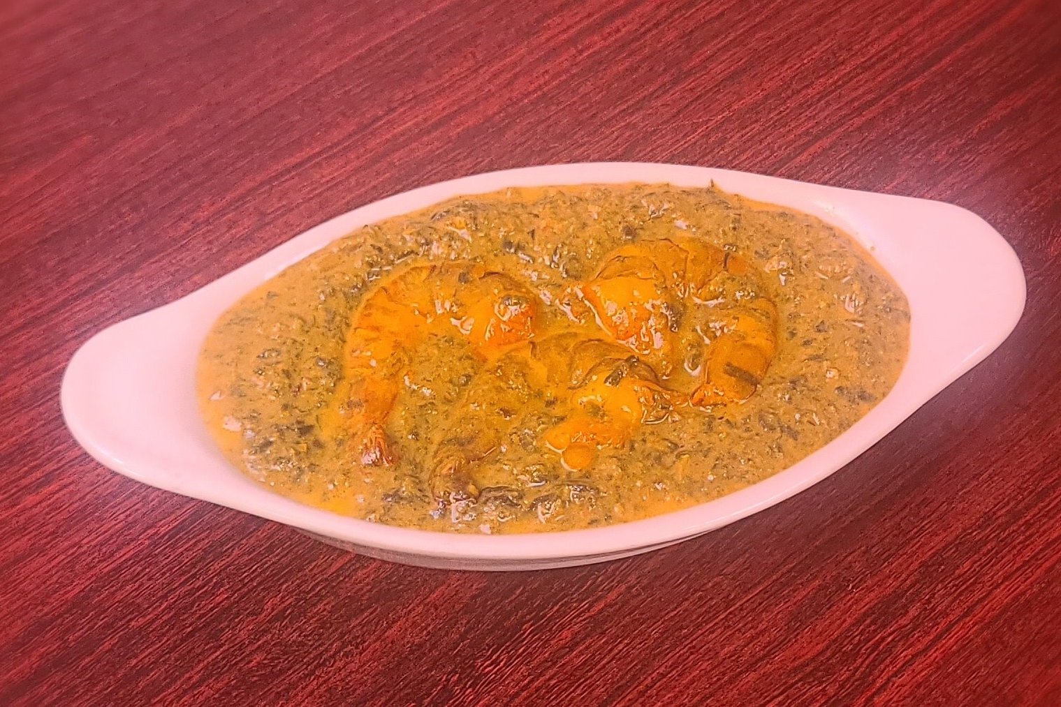 Order Shrimp Saag Curry food online from Om Indian Cuisine store, San Francisco on bringmethat.com