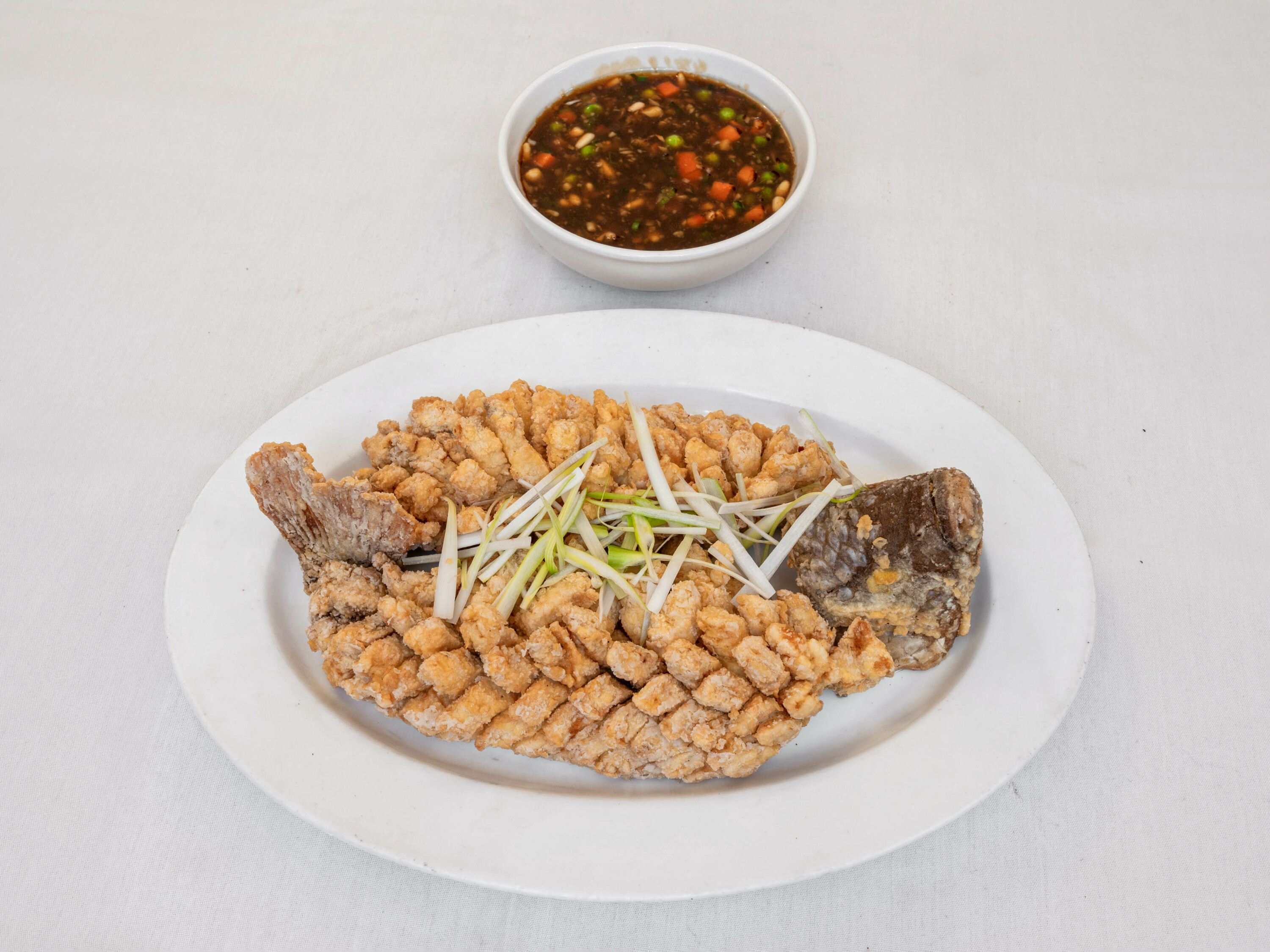 Order 83. Braised Whole Fish Filet with Pine Nuts food online from Wu Liang Ye store, New York on bringmethat.com