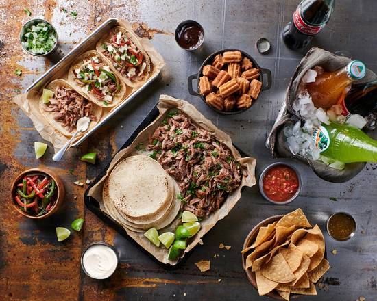 Order La Gran Reunión - Serves 8 (Served Family Style) food online from George Lopez Tacos store, Napa on bringmethat.com