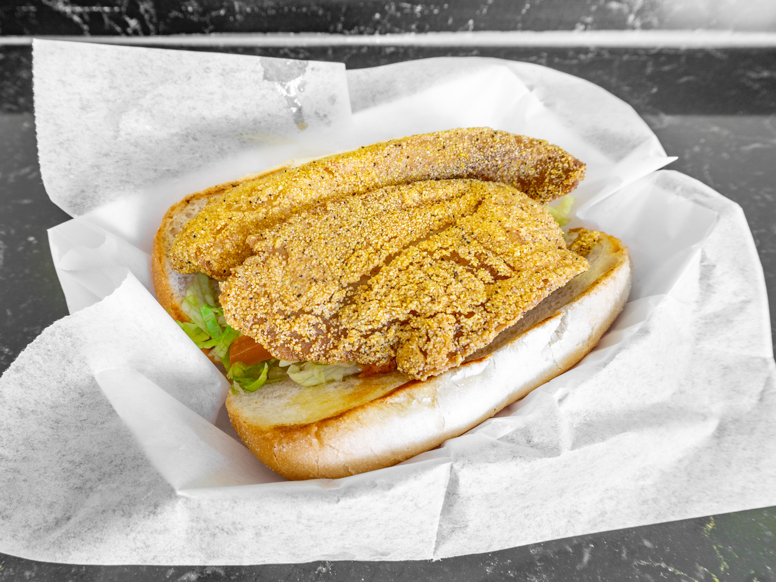 Order Tilapia Po-Boy food online from Surf Up South Shore store, Chicago on bringmethat.com