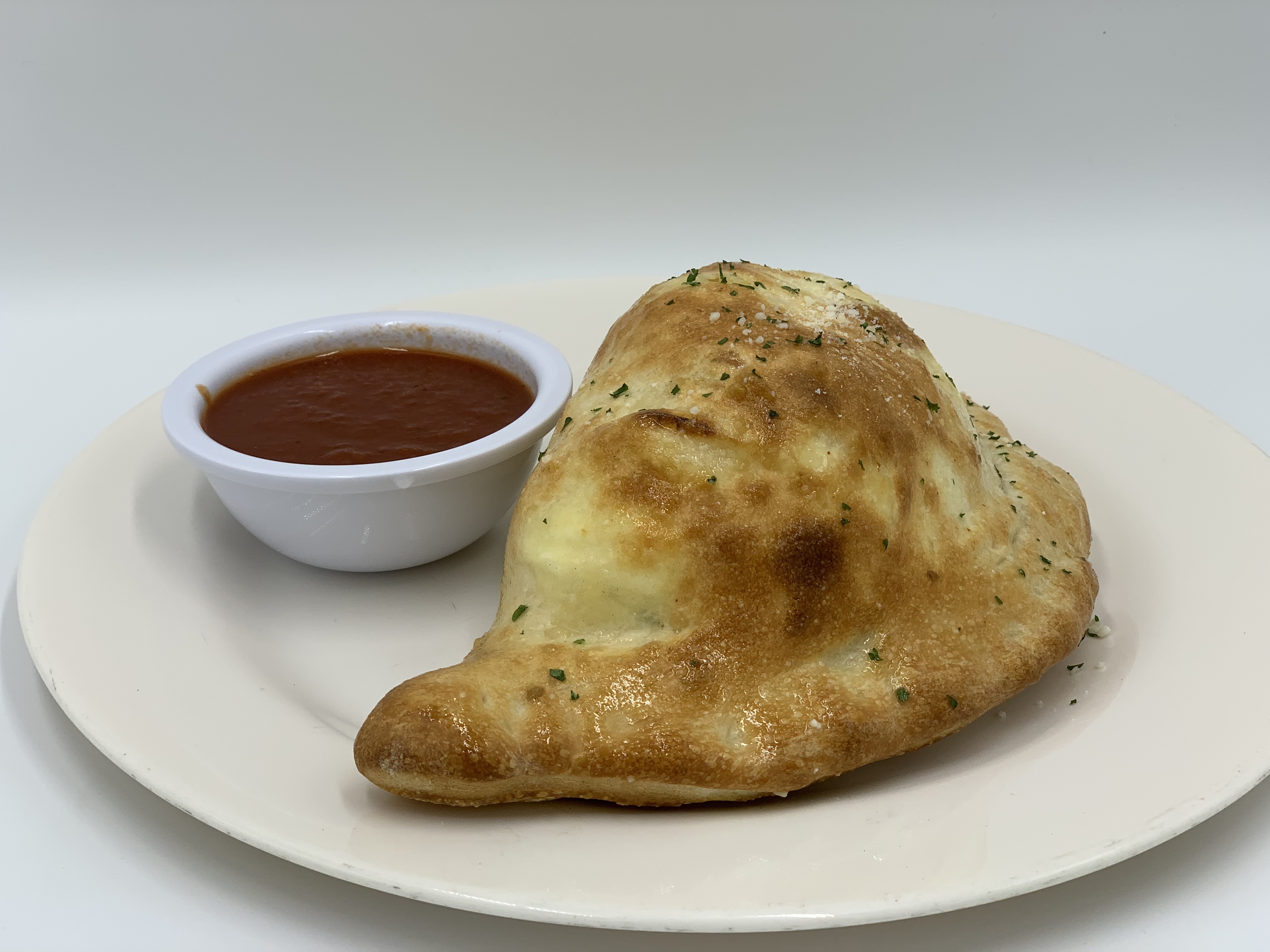 Order Calzone food online from Mario's Pizzeria of Seaford store, Seaford on bringmethat.com