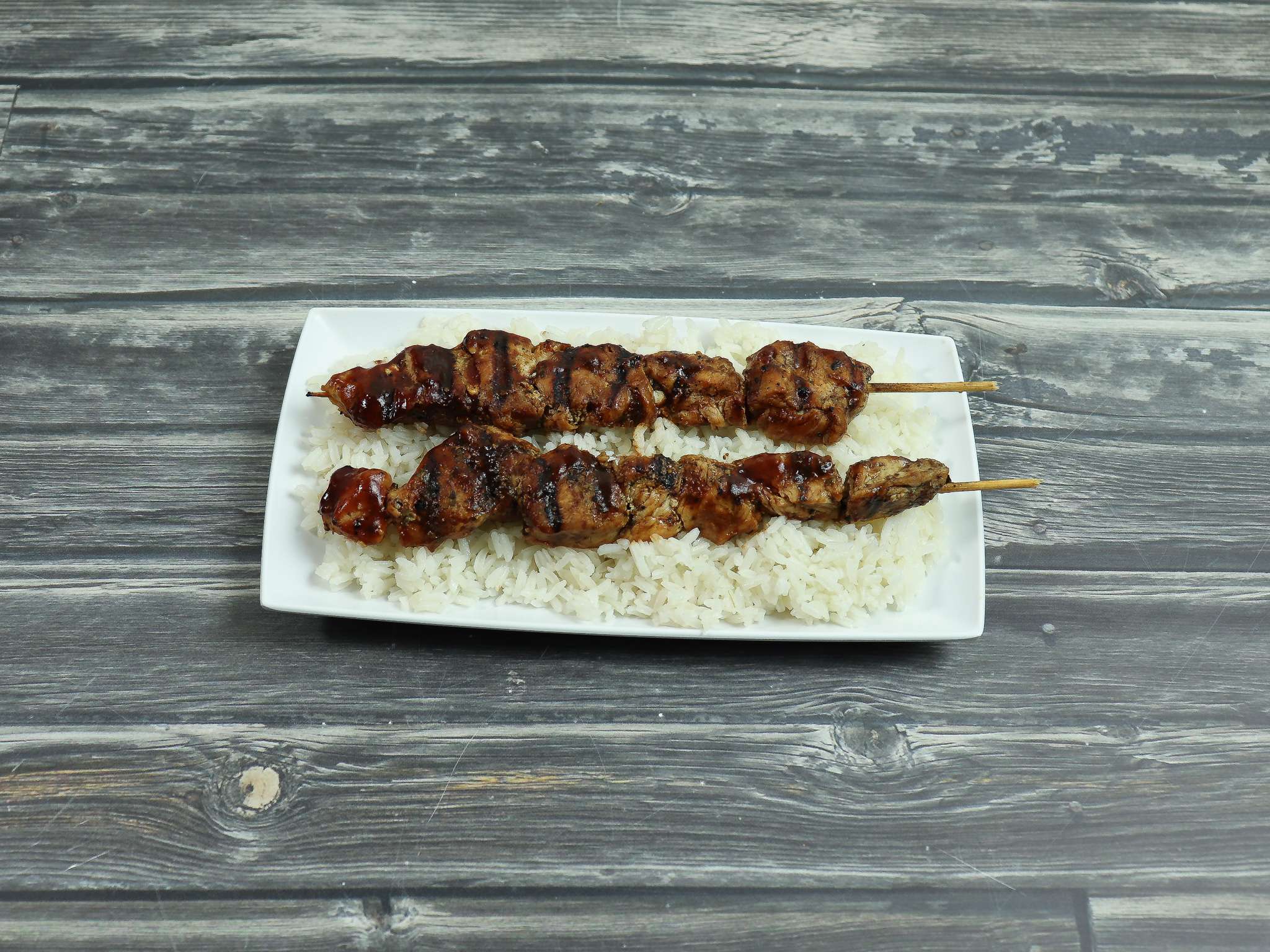 Order Meat Skewers with BBQ Sauce food online from Coqui Restaurant store, Lilburn on bringmethat.com