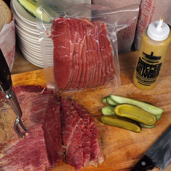 Order Sliced & Sealed Corned Beef by the pound food online from Katz's delicatessen store, New York on bringmethat.com