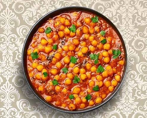 Order Garbanzo Beans Masala food online from Eternal Clay Pot store, Chantilly on bringmethat.com