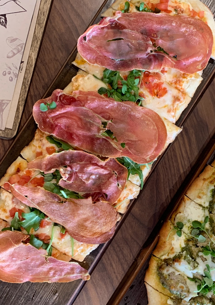 Order 3 Cheese with Cracked Prosciutto Flatbread food online from Graze By Sam store, San Diego on bringmethat.com