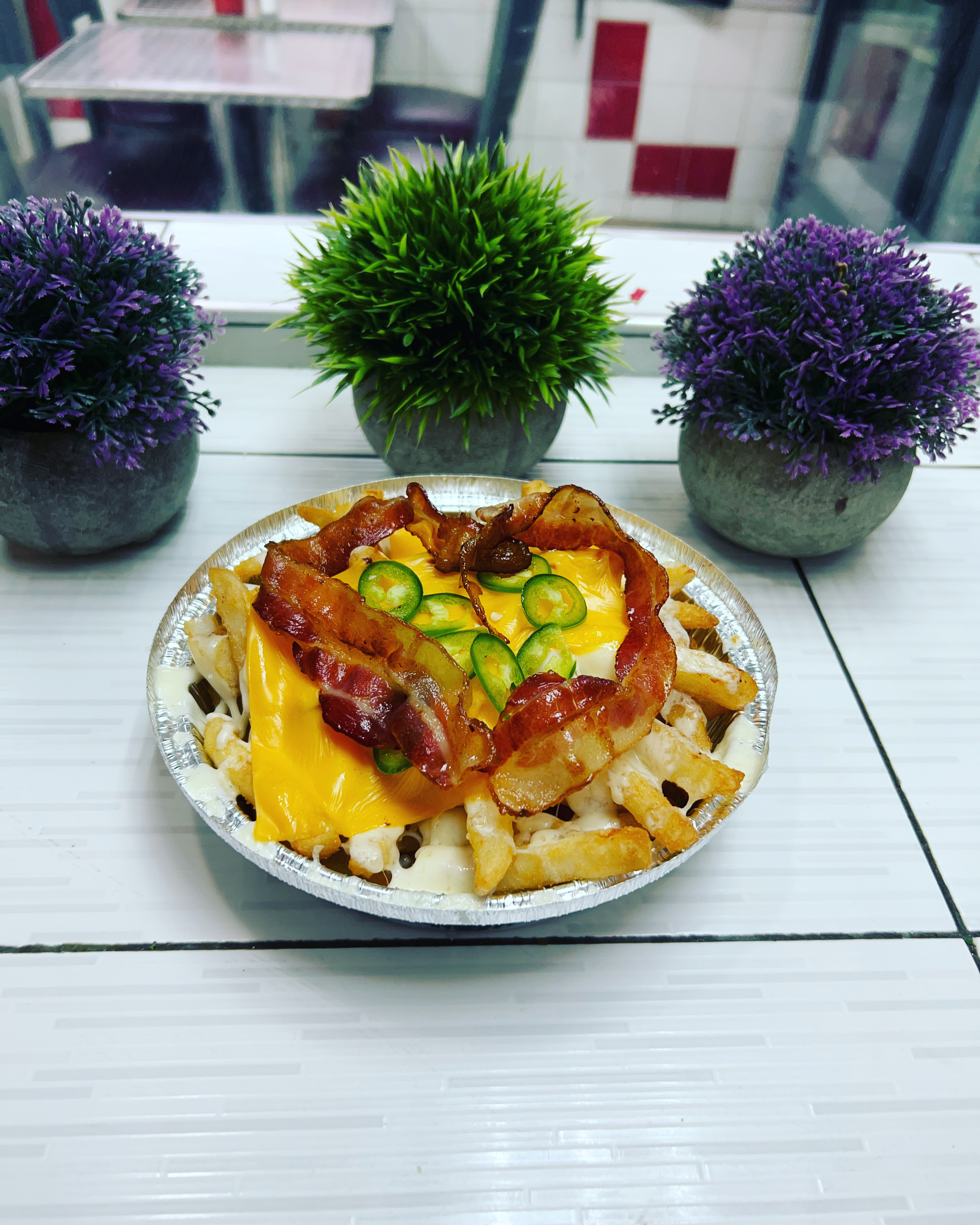 Order Jalapeno Cheese Fries with Bacon and Mozzarella Cheese food online from Johnny's Pizza Diner store, Bronx on bringmethat.com