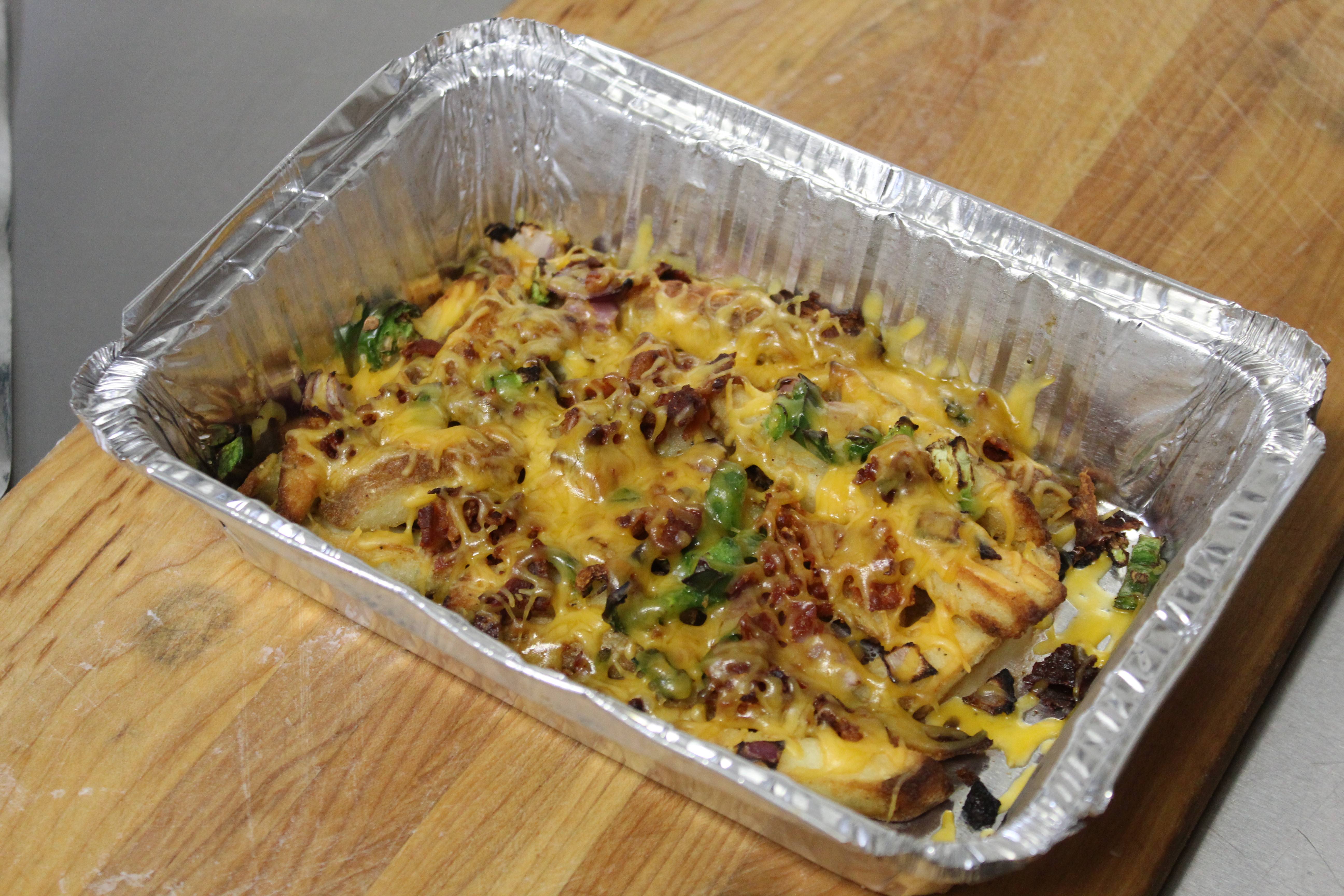 Order Loaded Fries food online from Mama Mary Pizza store, Holland on bringmethat.com