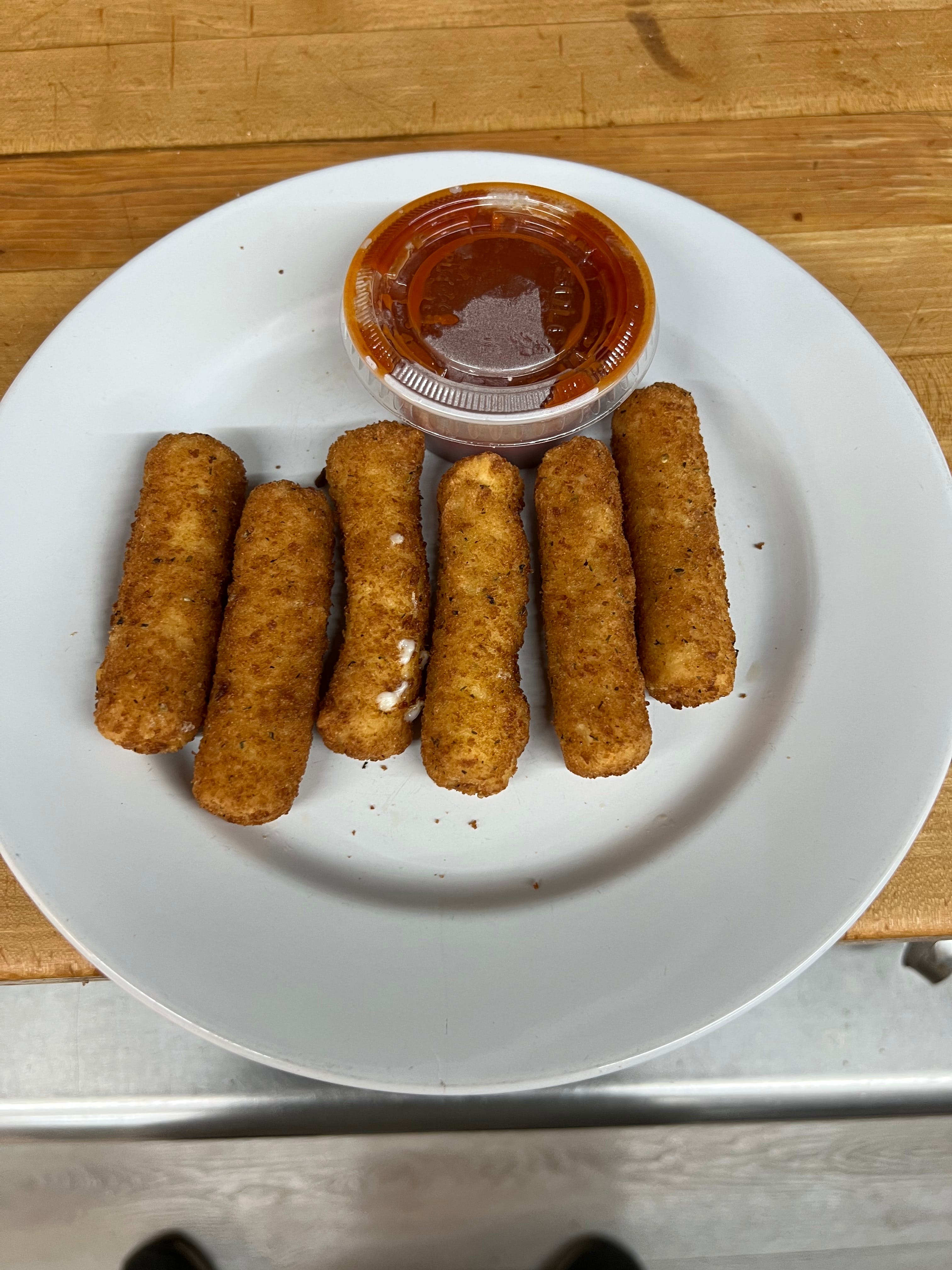 Order Fried Mozzarella - 6 Pieces food online from Andre's Pizza store, Oxford on bringmethat.com