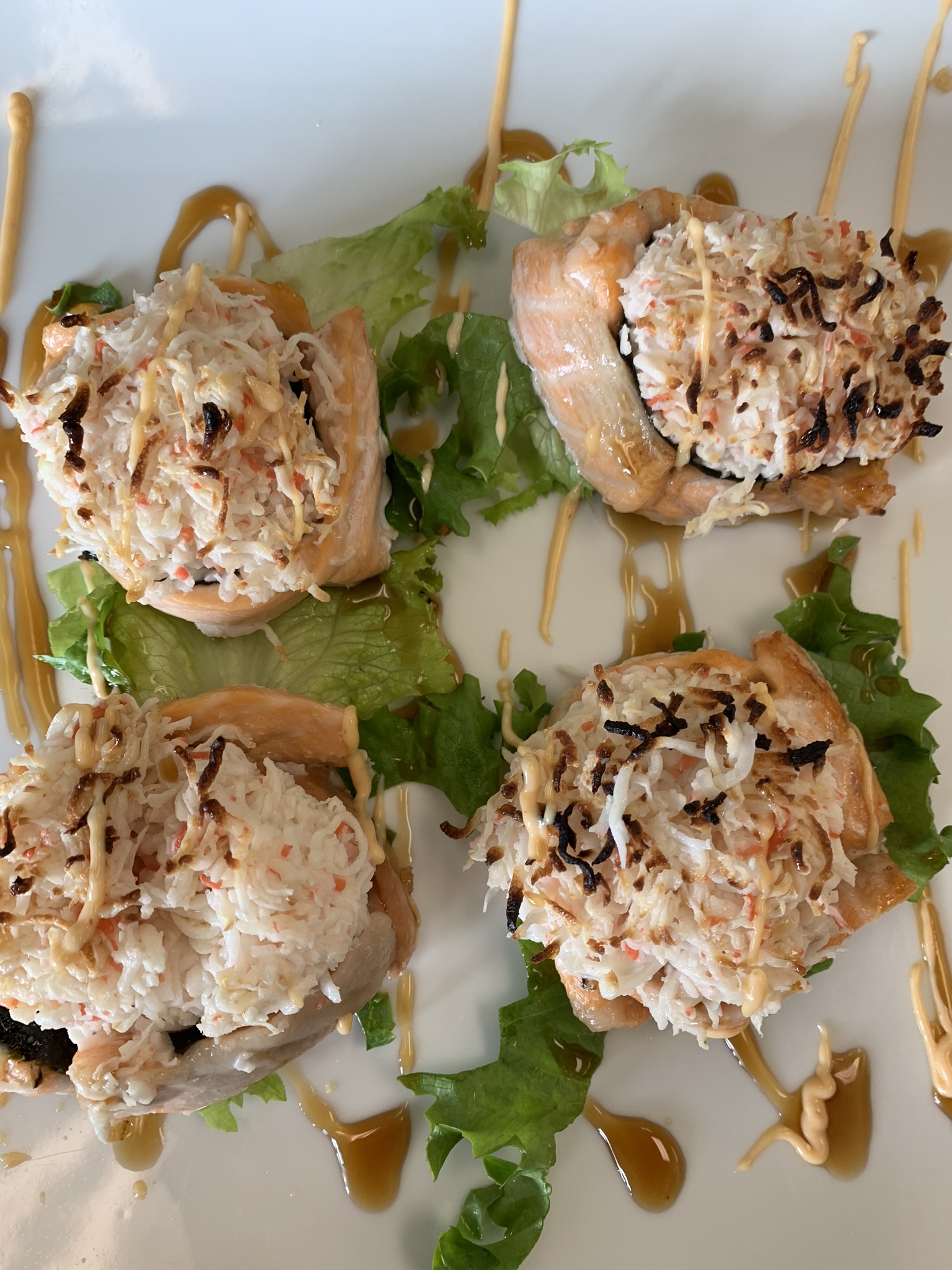 Order 4 Piece Baked Salmon Roll food online from Jazz Sushi Bar store, New Orleans on bringmethat.com