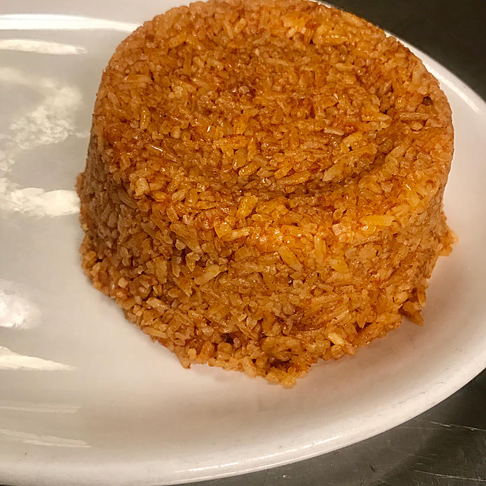 Order Djolof Rice food online from Yassa African Restaurant store, Chicago on bringmethat.com