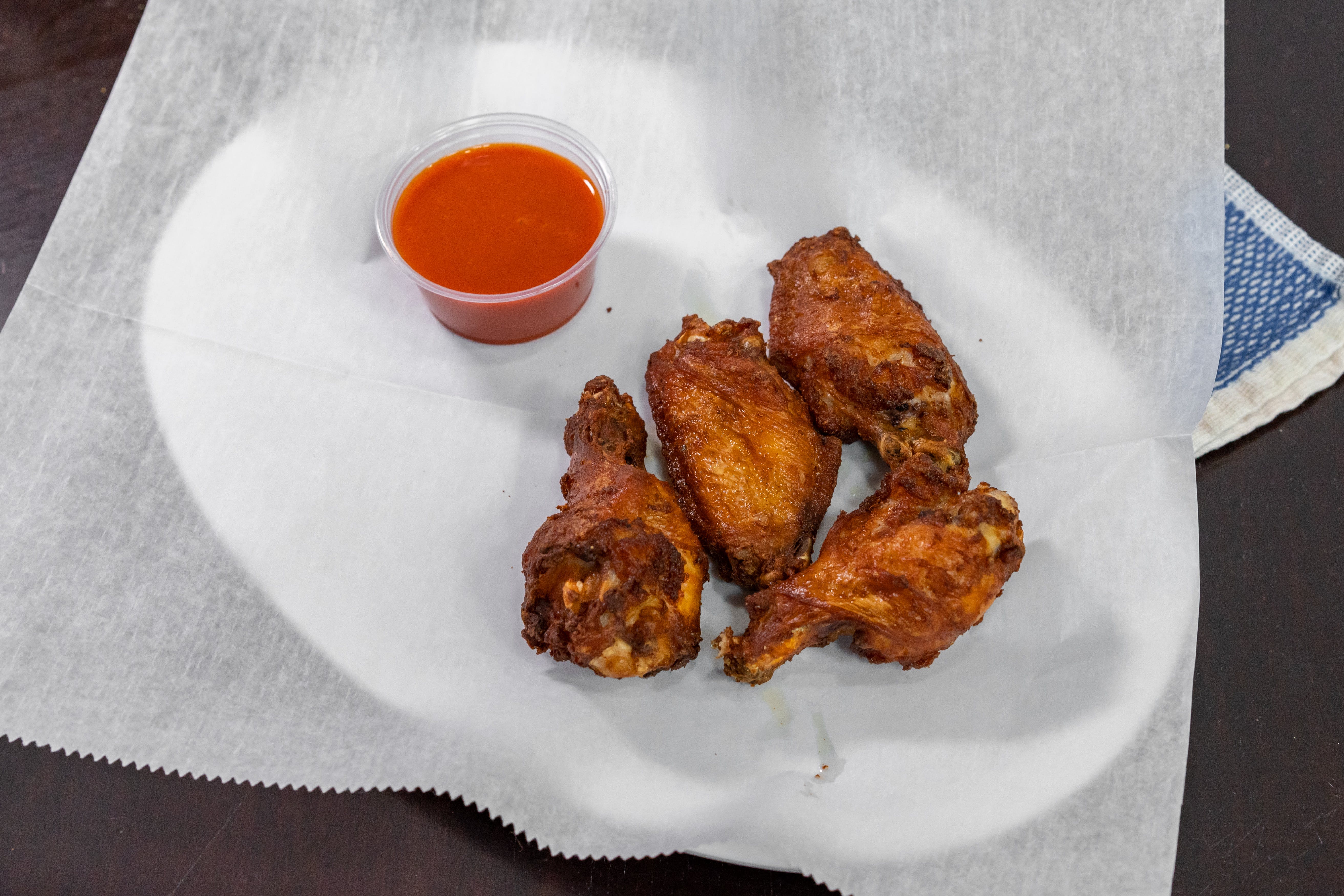Order Wings - 10 Pieces food online from Andriano's Pizza store, Delmar on bringmethat.com