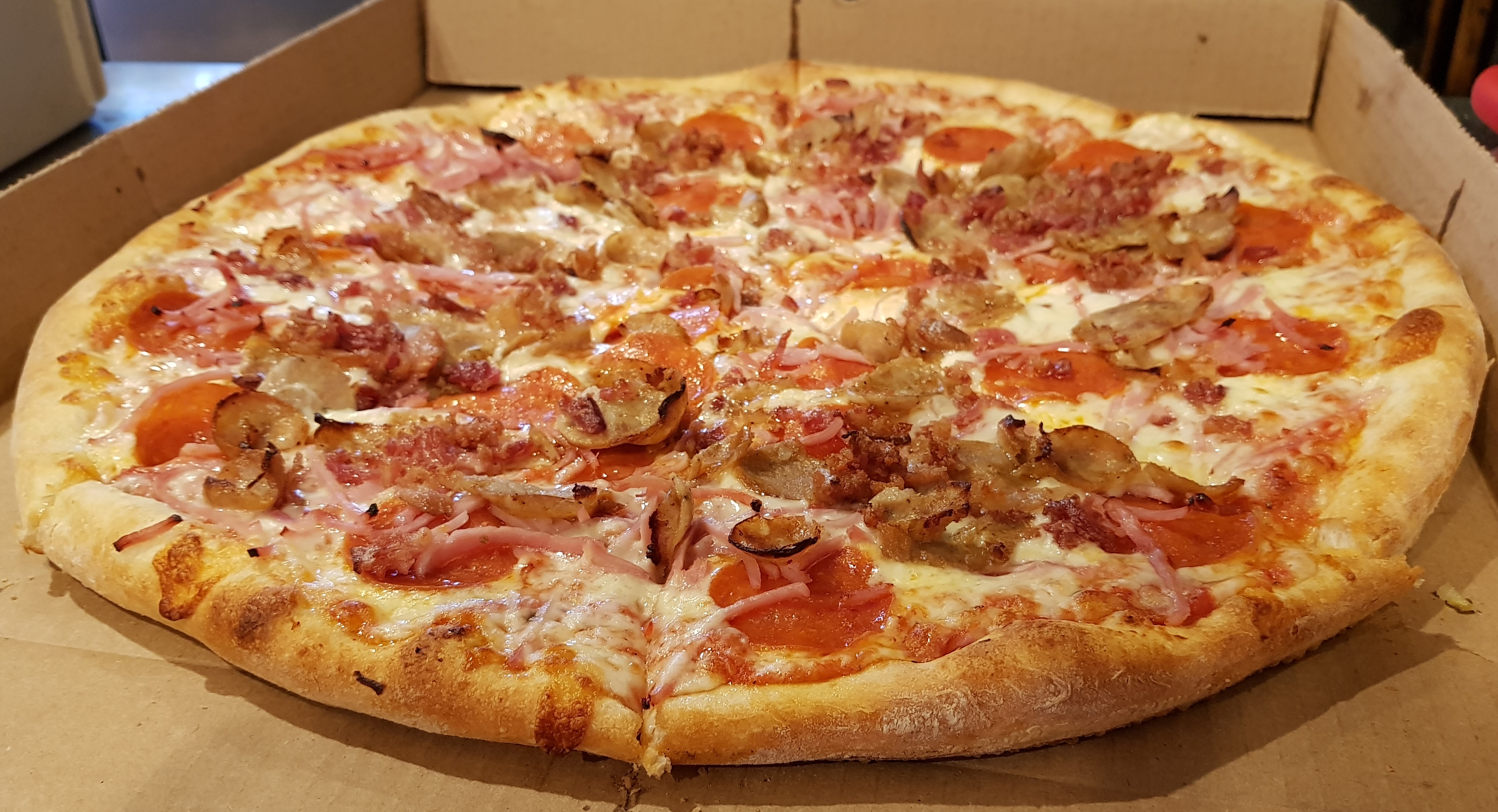 Order Meat Feast Pizza food online from Two Cousins Paradise store, Paradise on bringmethat.com