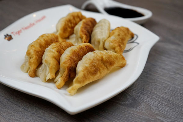 Order Pork Pot Stickers food online from Tiger Noodle House store, Houston on bringmethat.com