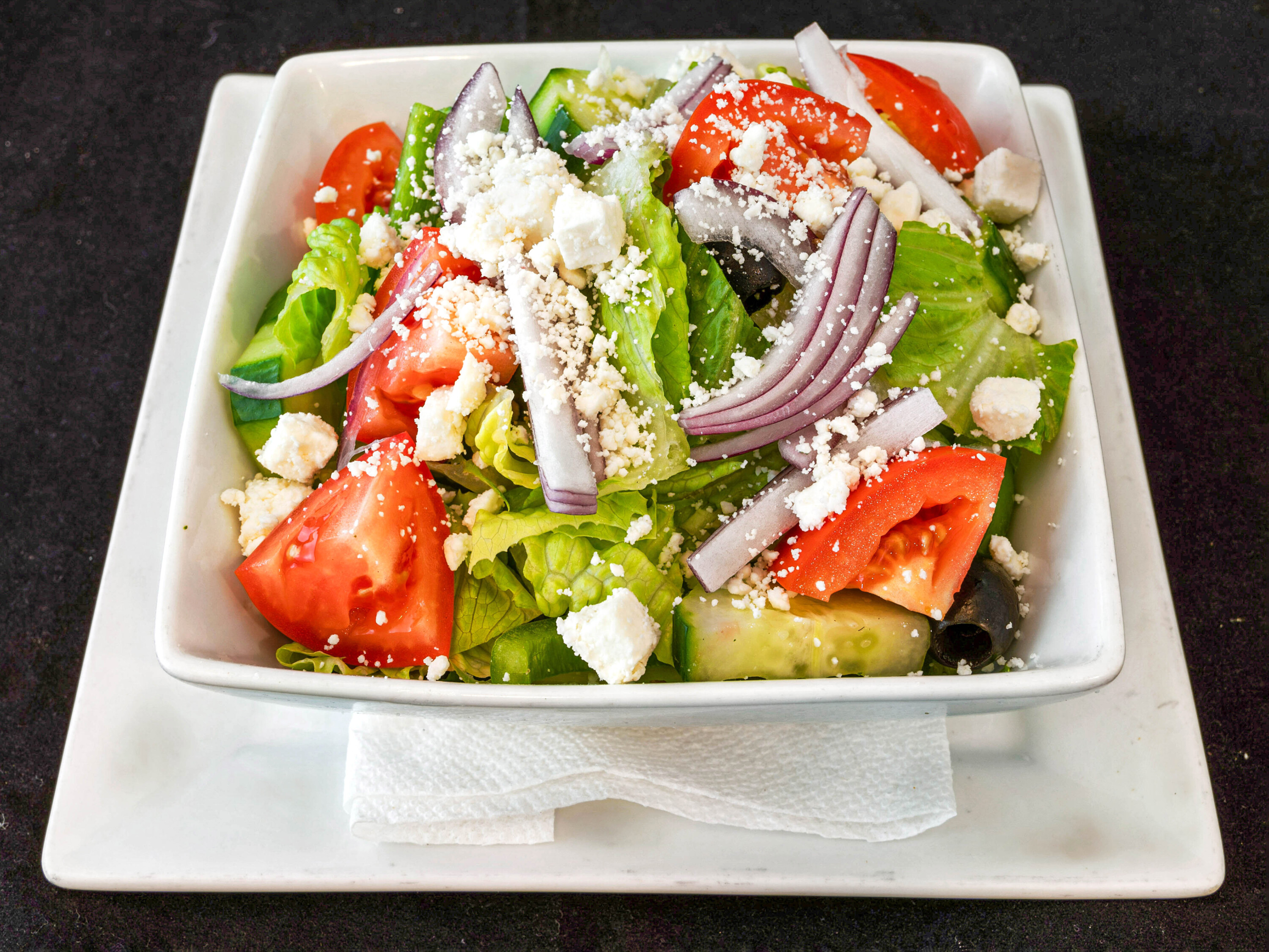 Order Greek Salad food online from Bravo NY Pizza store, New Milford on bringmethat.com