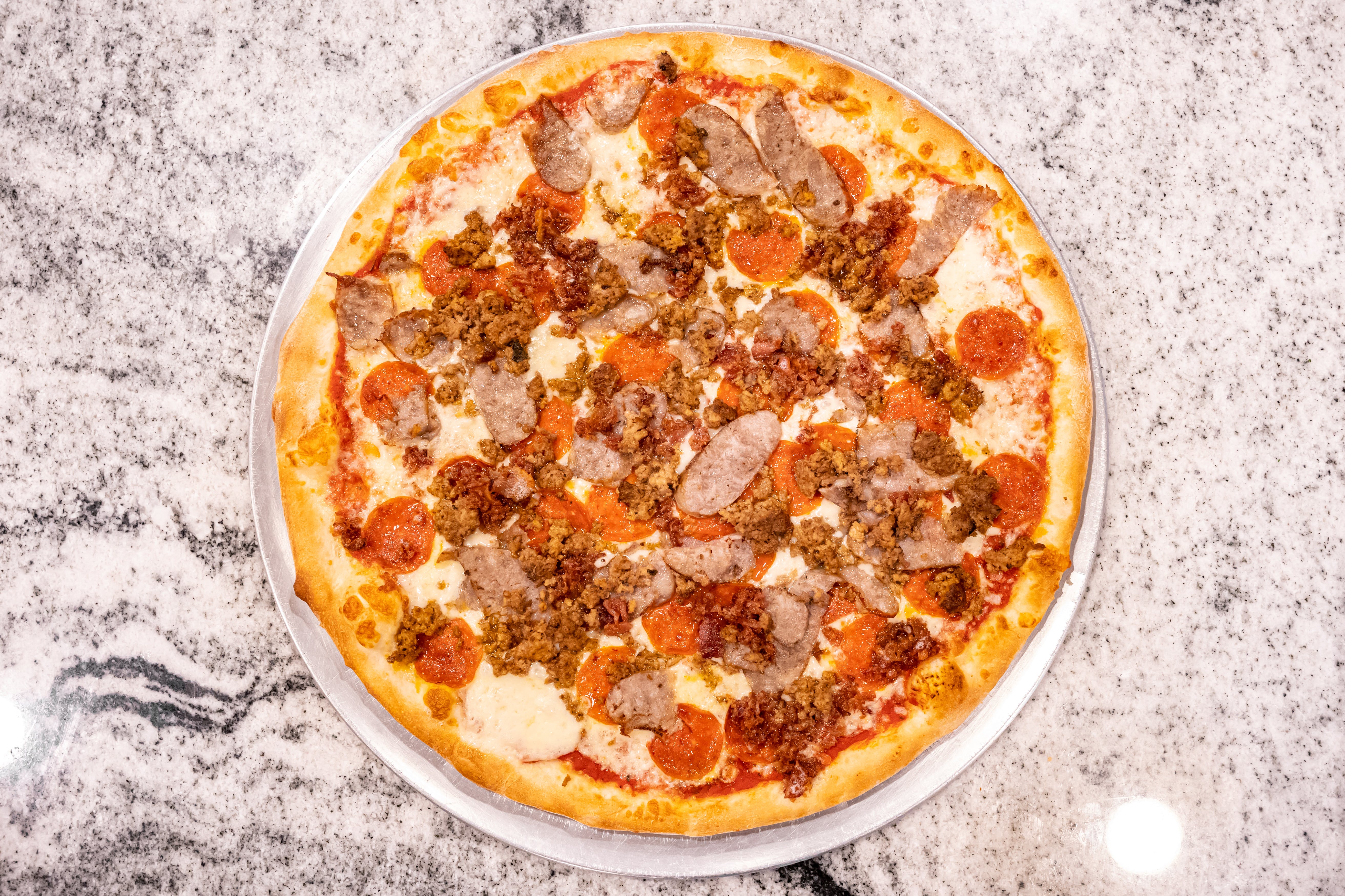 Order Meat Lover's Pizza - Personal 12" food online from Luigi Famiglia Cucina store, Carmel Hamlet on bringmethat.com