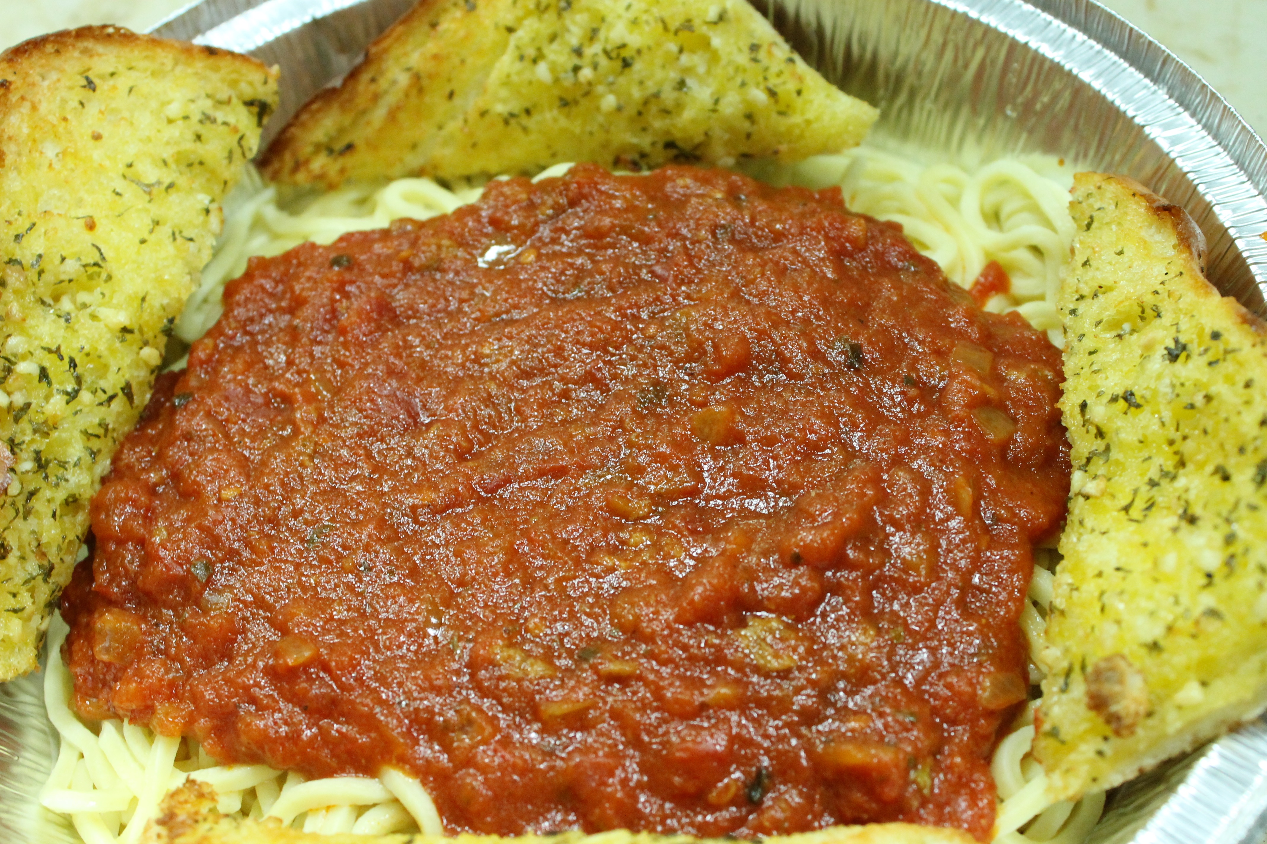 Order Spaghetti Meal food online from Bellacino's Pizza & Grinders store, Keego Harbor on bringmethat.com