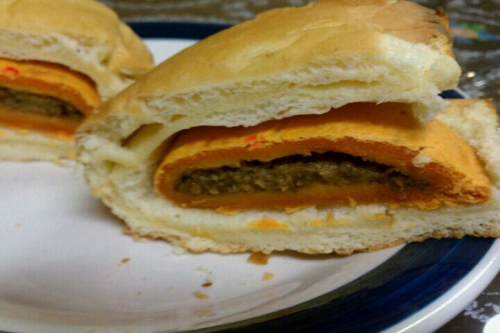 Order Beef Patty with Cheese & Coco Bread food online from Nas Deli And Grill store, Queens on bringmethat.com