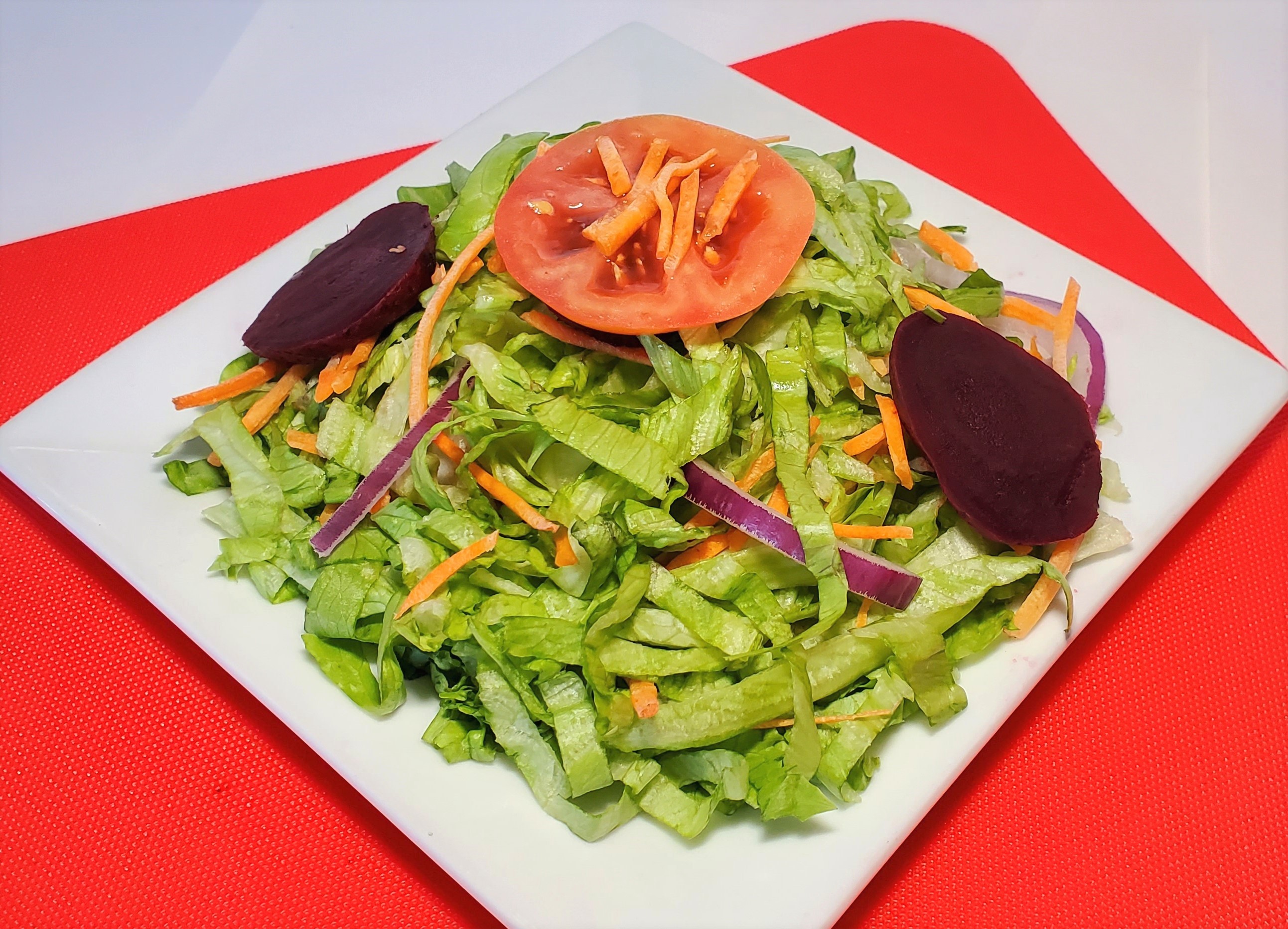 Order Ensalada (Side Salad) food online from Mochica Restaurant store, Norwalk on bringmethat.com