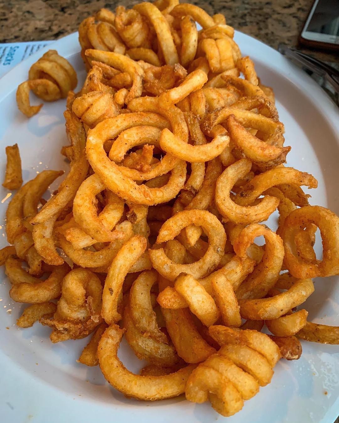 Order Curly Fries food online from 5 brothers gourmet deli store, New York on bringmethat.com