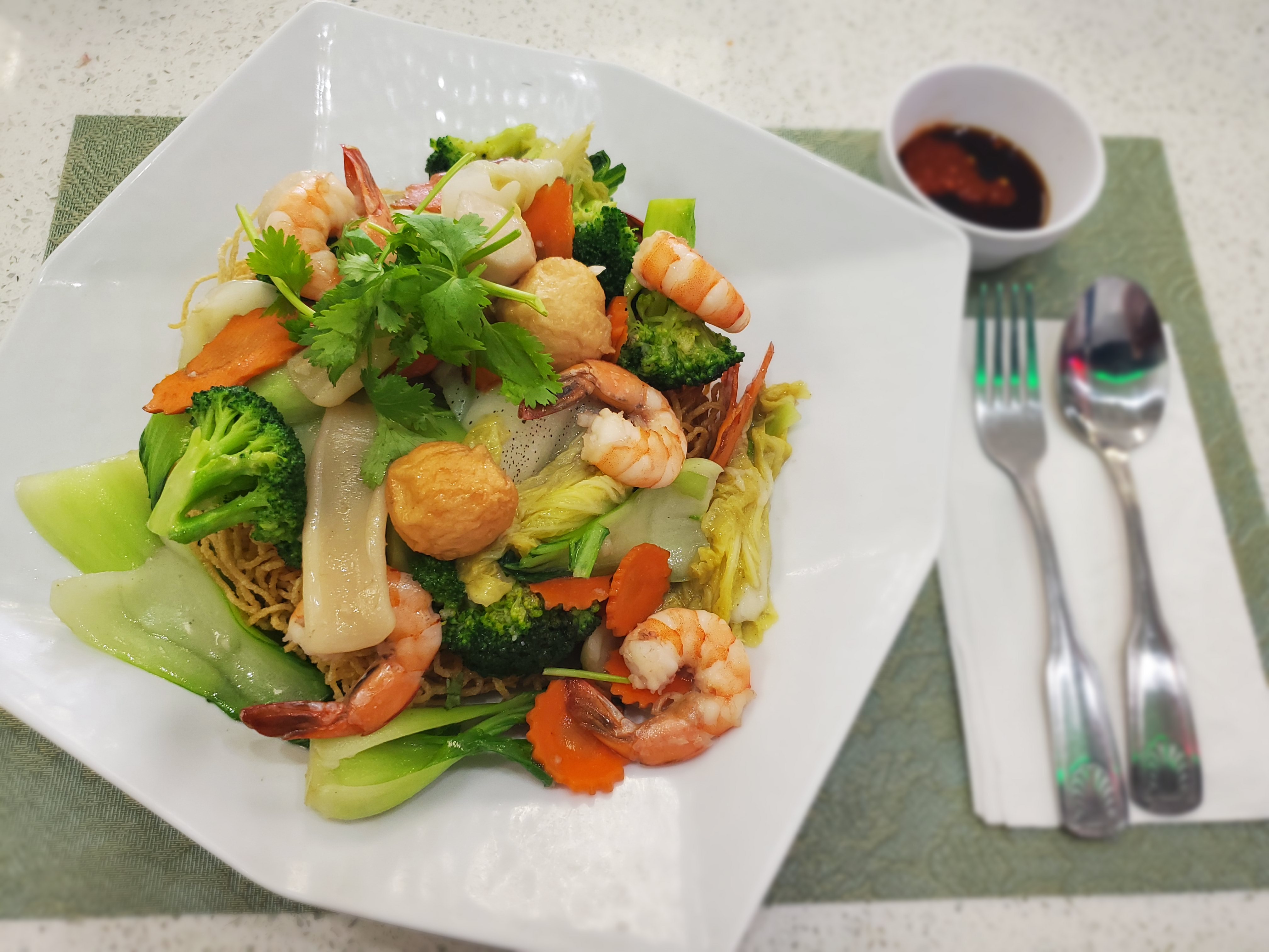 Order 43. Seafood Crispy Noodle food online from Pho Saigon Le store, Victorville on bringmethat.com