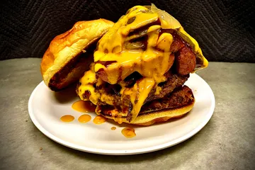 Order The Extreme Road Kill Burger food online from Lucky Chicago Style Grill store, Round Rock on bringmethat.com
