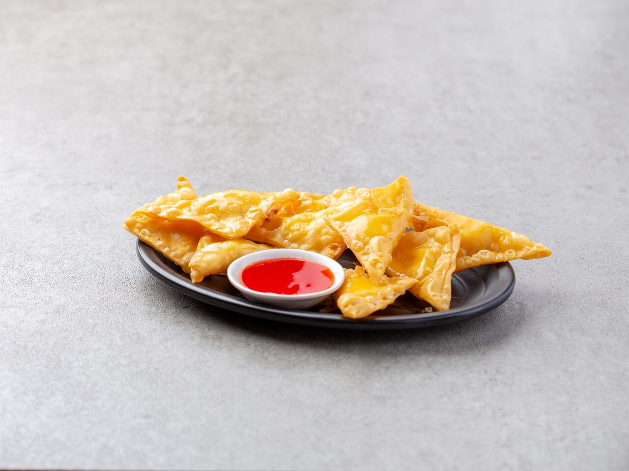 Order 3. Fried Crab Rangoons food online from Tasty Wok store, Rochester on bringmethat.com