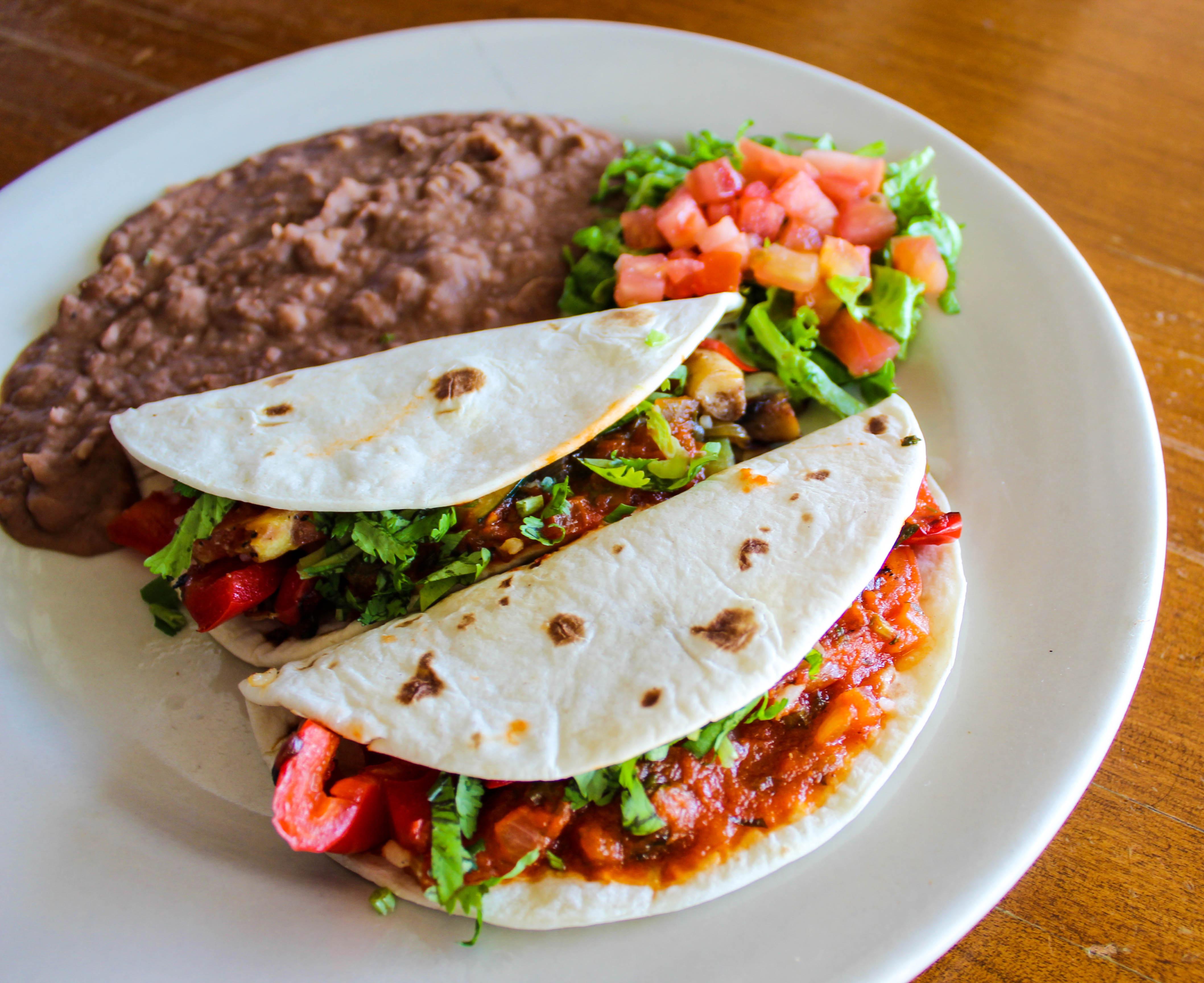 Order Veggie Tacos food online from Las Palomas store, Austin on bringmethat.com