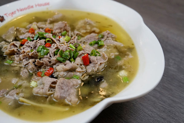 Order Sour Soup Sliced Lamb food online from Tiger Noodle House store, Houston on bringmethat.com