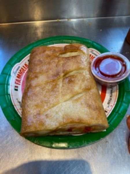 Order Spinach Stromboli food online from Famous famiglia pizza store, New York on bringmethat.com