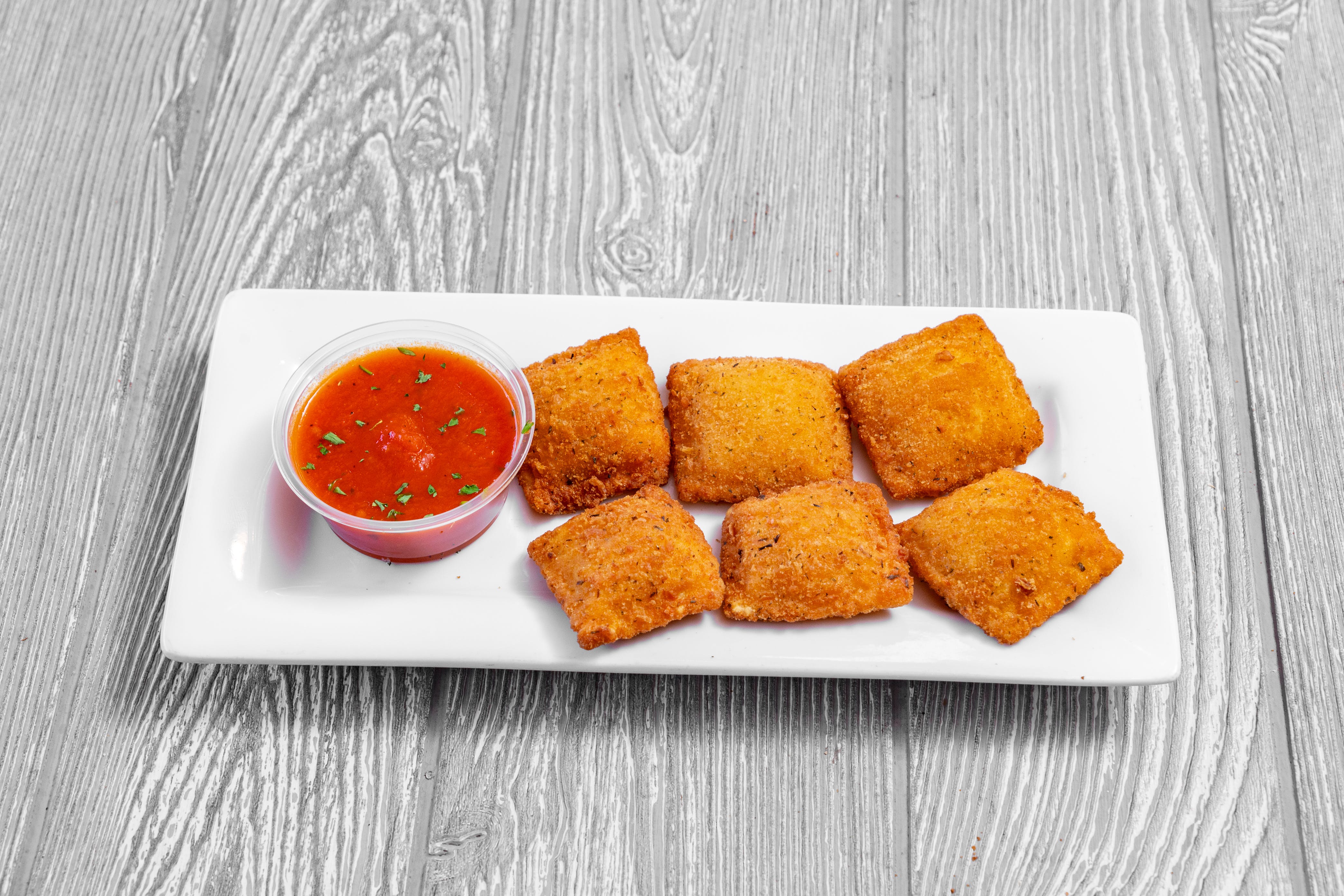 Order Fried Ravioli - Appetizer food online from Palermo Italian Grill store, Northampton on bringmethat.com