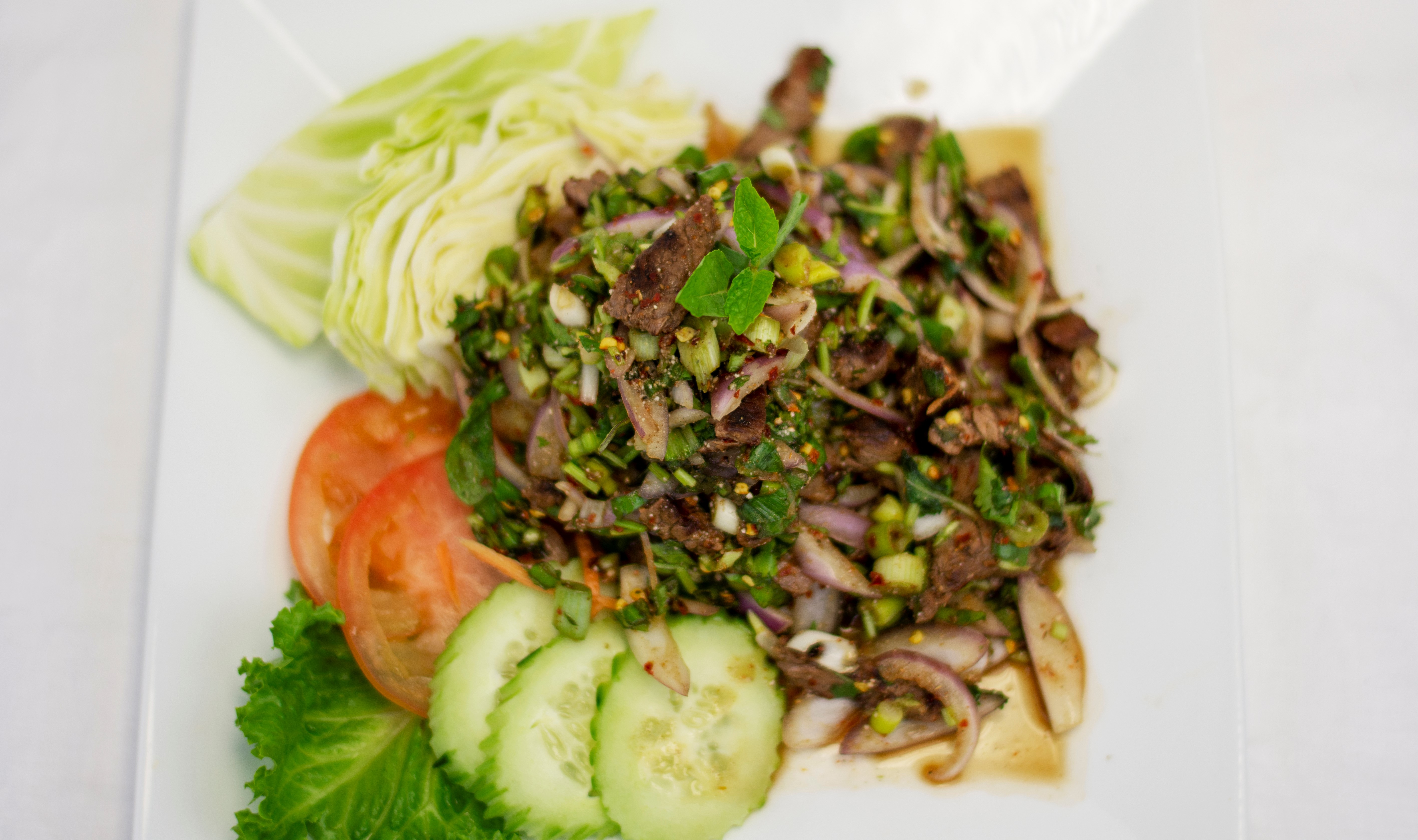 Order Grilled Beef Salad food online from Salween Thai store, Omaha on bringmethat.com