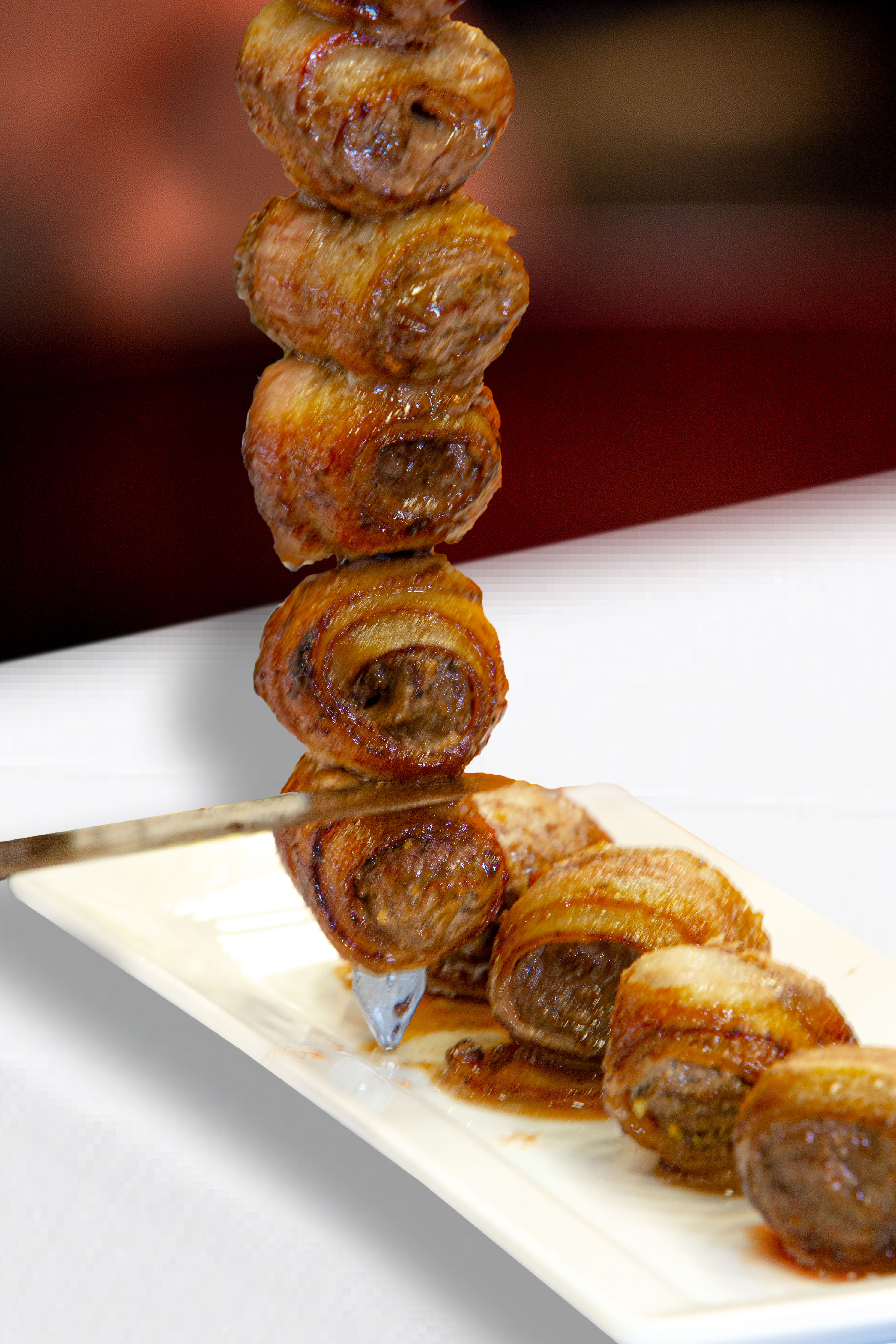 Order Filet Mignon Wrapped with Bacon Specialty food online from Rios Brazilian Steakhouse store, Charlotte on bringmethat.com