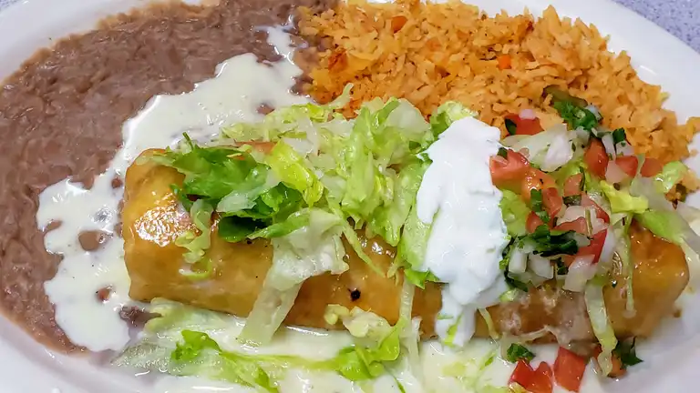 Order Chicken Chimichanga food online from Luna Mexican Rotiserrie store, Louisville on bringmethat.com