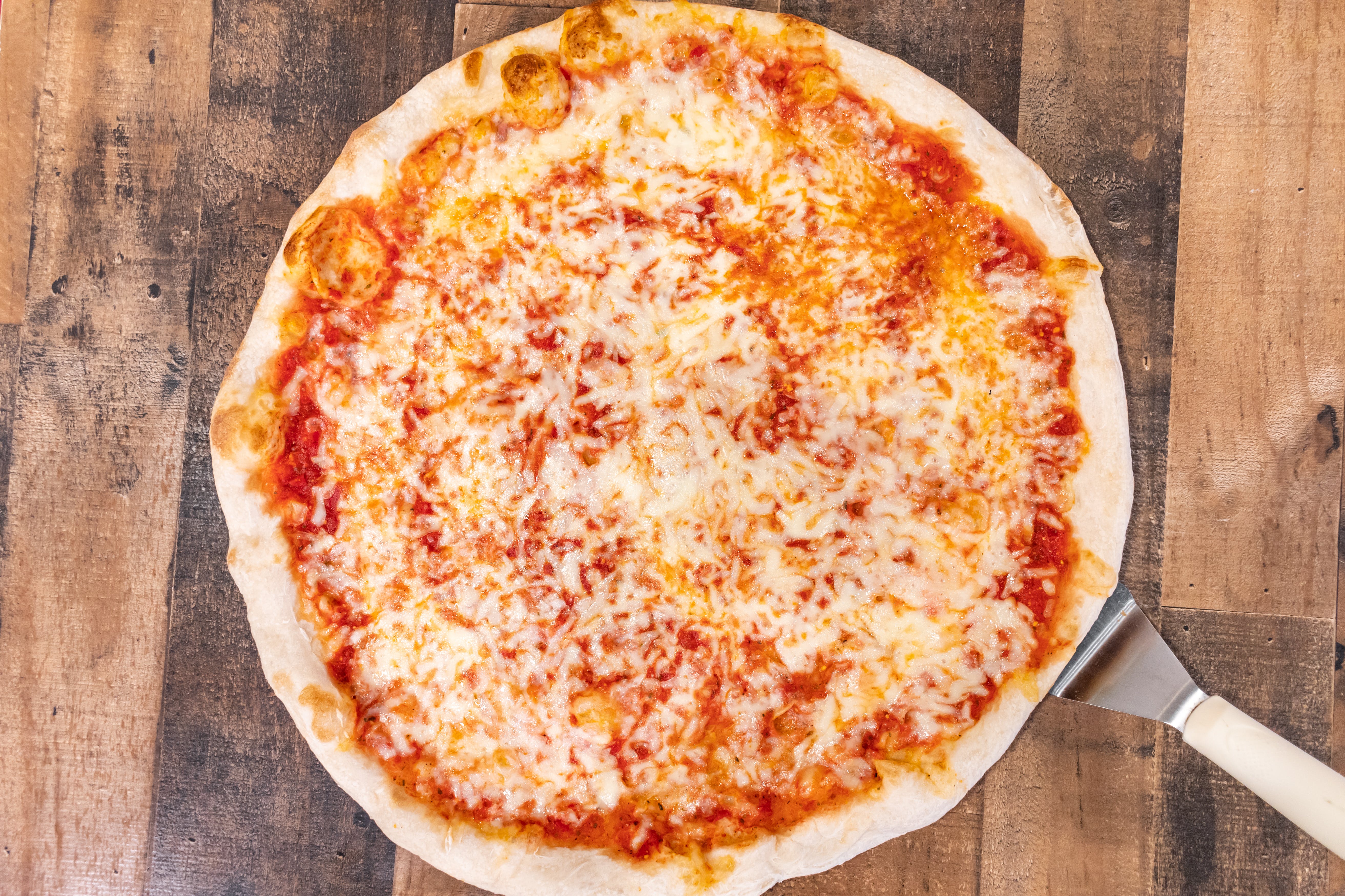 Order NY Style Thin Crust Cheese Pizza - Large 14" (8 Slices) food online from Bella Pizzeria - Carmel store, Carmel on bringmethat.com