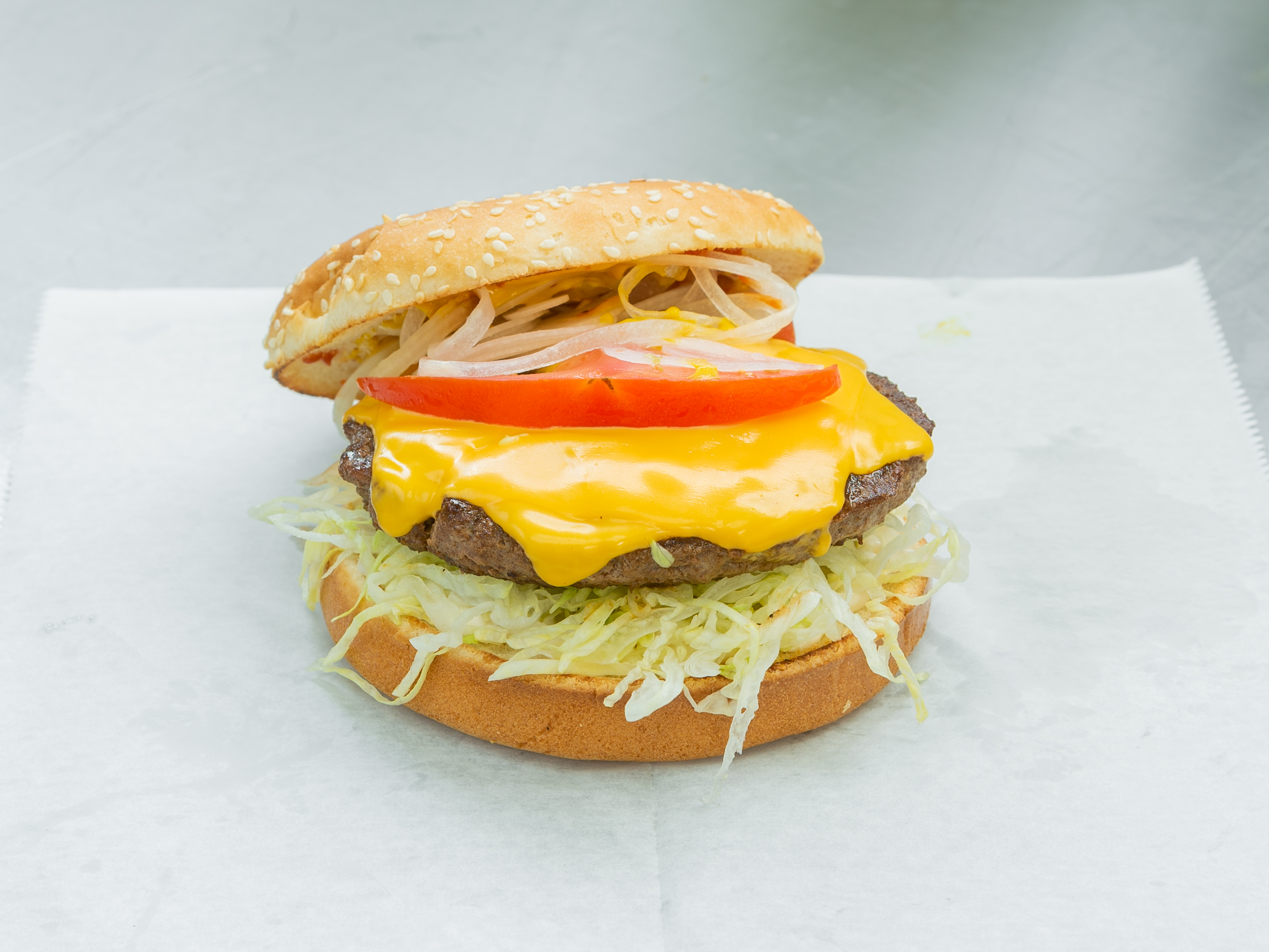 Order 1/2 lb. Burger food online from Z Surf And Turf store, Cleveland on bringmethat.com