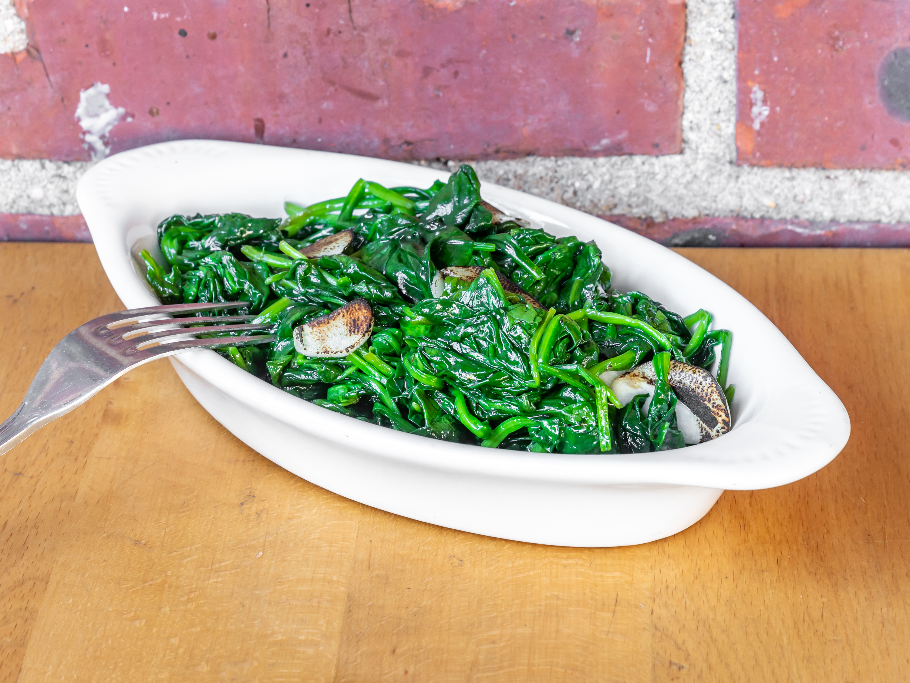 Order Sauteed Spinach food online from Wild store, New York on bringmethat.com