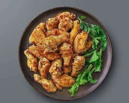 Order Garlicky Goodness wings food online from Poultry Provisions store, Walnut Creek on bringmethat.com
