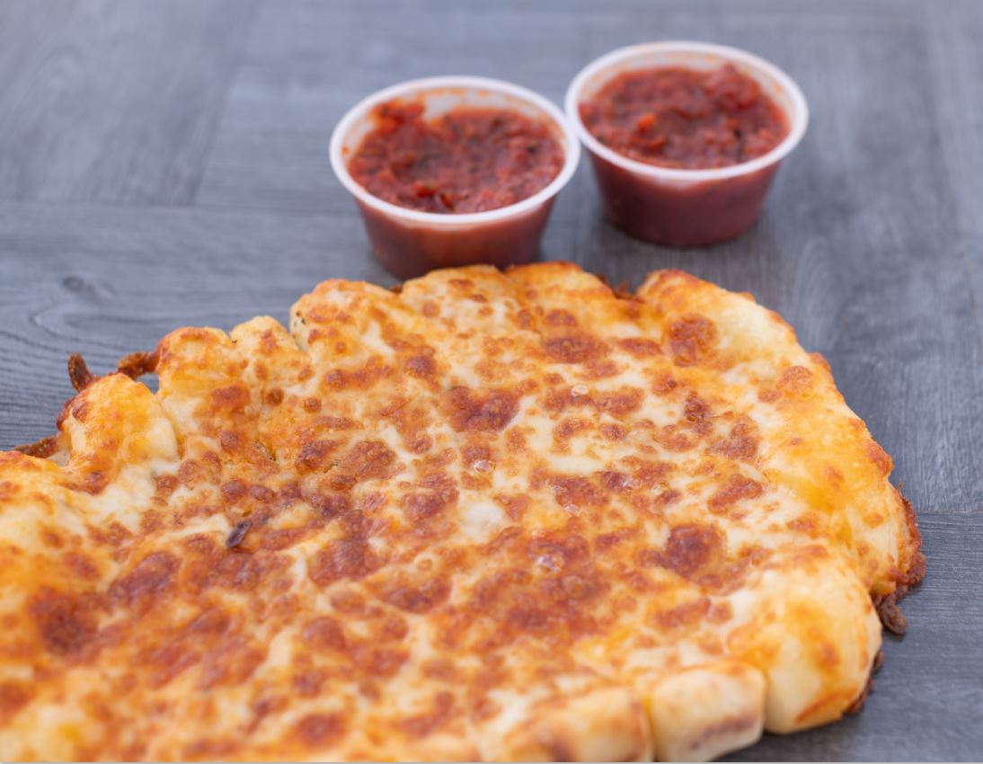 Order Cheesy  food online from Champ Pizza store, Clark County on bringmethat.com