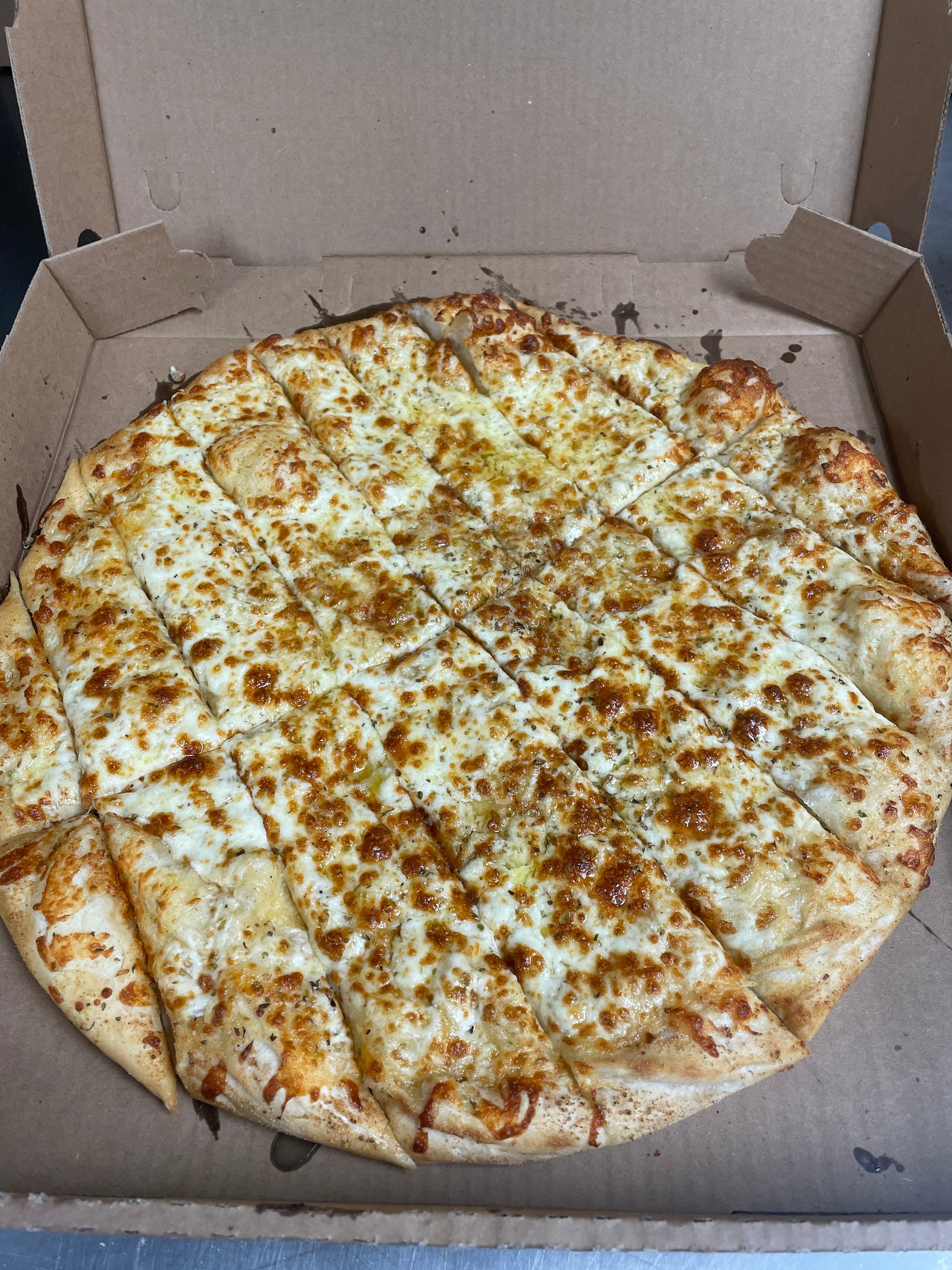 Order Cheesy Breadsticks - Appetizer food online from Mick's Pizza store, Cohoes on bringmethat.com