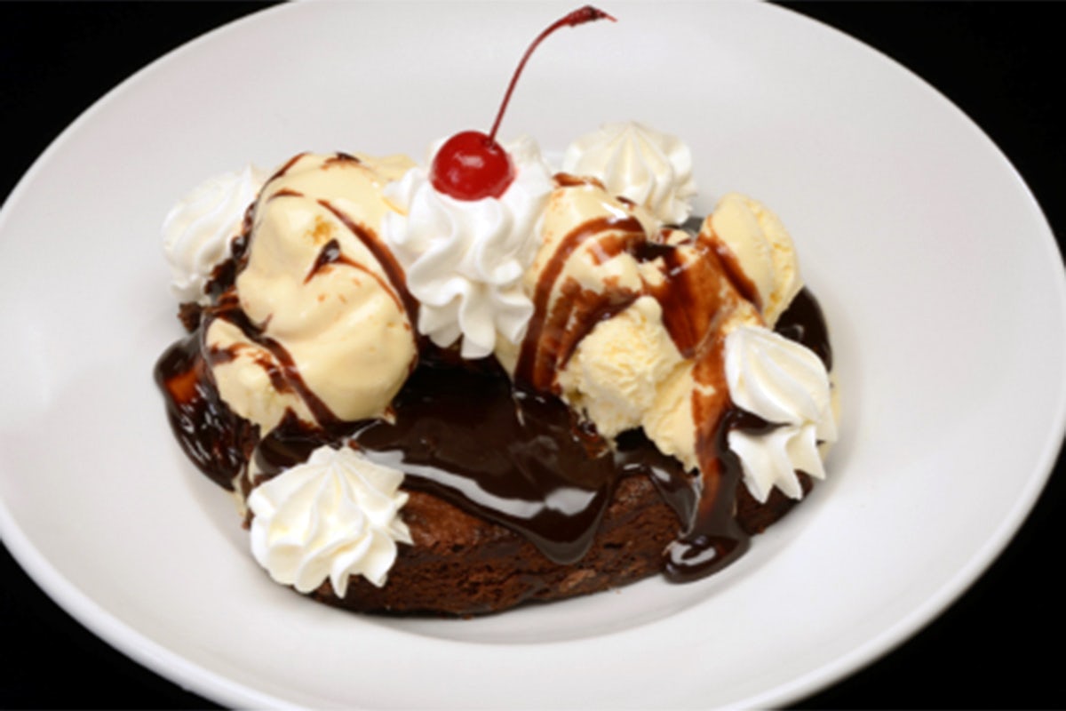 Order GHIRARDELLI® CHOCOLATE BROWNIE SUNDAE food online from Miller'S Ale House store, Dawsonville on bringmethat.com